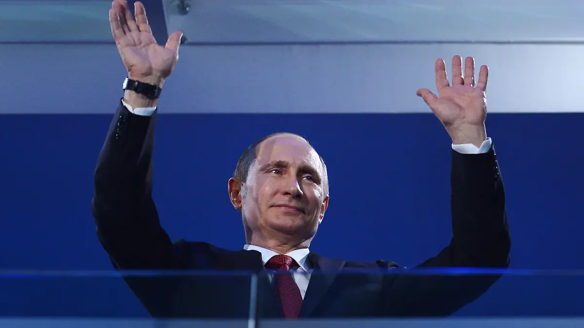 SOCHI, RUSSIA - MARCH 16:  Russia President Vladimir Putin waves during the Sochi 2014 Paralympic Winter Games Closing Ceremony at Fisht Olympic Stadium on March 16, 2014 in Sochi, Russia.  (Photo by Dennis Grombkowski/Getty Images) *** BESTPIX ***