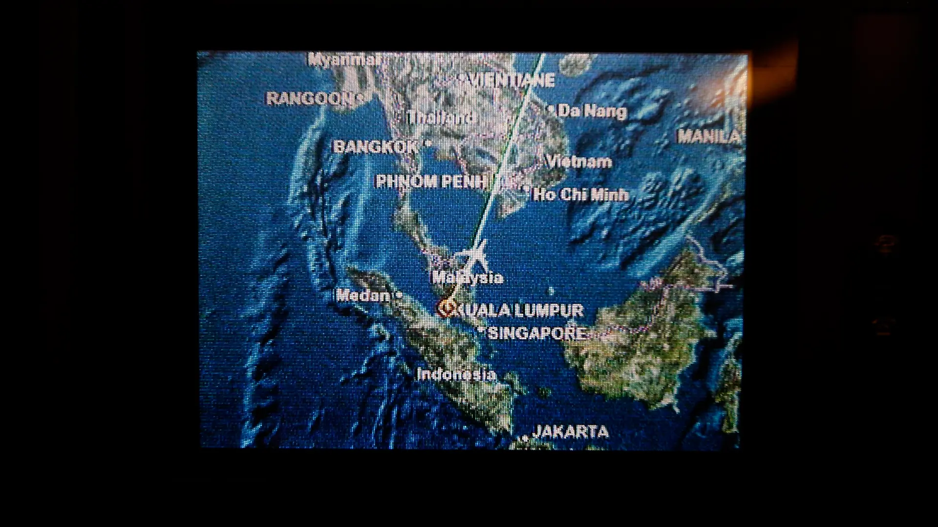 A screen on board Malaysia Airlines Boeing 777-200ER flight MH318 shows the plane's flight path as it cruises over the South China Sea from Kuala Lumpur towards Beijing, at approximately the same point when on March 8 flight MH370 lost contact with air traffic controllers, at approximately 1.30am March 17, 2014. Malaysia Airlines flight number MH318 replaces the flight number of the missing airplane, MH370, that was retired as a mark of respect to the passengers and crew while the flight route remains unchanged. Reuters photographer Edgar Su boarded the flight in Kuala Lumpur on March 17 and documented the journey to Beijing. This is picture number 16 of 23 in this series. REUTERS/Edgar Su (TRANSPORT TPX IMAGES OF THE DAY)