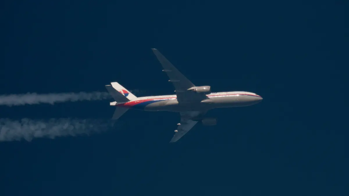REFILE - REMOVING FLIGHT NUMBER IN FIRST SENTENCEBoeing 777 Malaysian Airlines with the registration number 9M-MRO flies over Poland February 5, 2014. Malaysia Airlines Flight MH370, with 239 people on board, dropped off air traffic control screens at about 1:30 a.m. on March 8, 2014, less than an hour into a flight from Kuala Lumpur to Beijing. There were no reports of bad weather or mechanical problems. Picture taken February 5, 2014. REUTERS/Tomasz Bartkowiak (POLAND - Tags: TRANSPORT DISASTER)