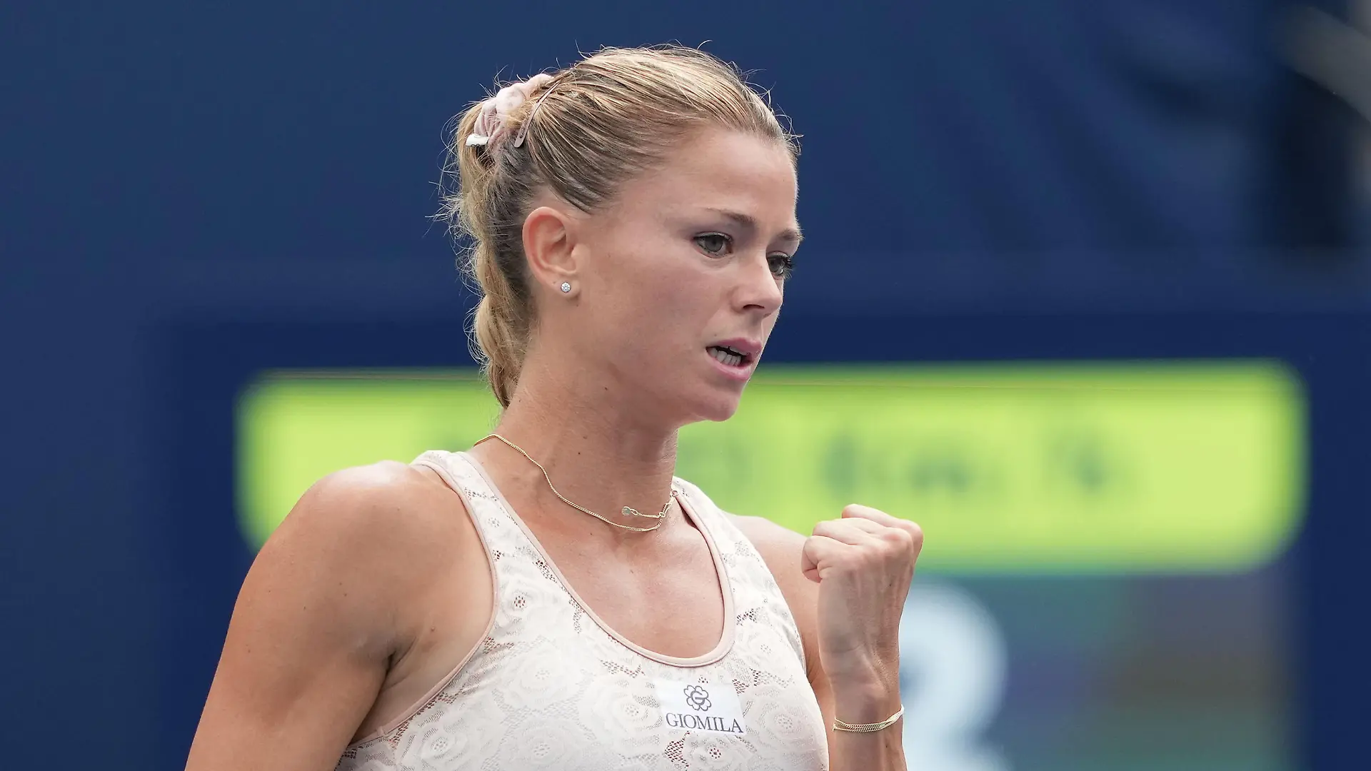(220810) -- TORONTO, Aug. 10, 2022 (Xinhua) -- Camila Giorgi of Italy celebrates scoring during the first round of women's singles match between Emma Raducanu of Britain and Camila Giorgi of Italy at the 2022 National Bank Open tennis tournament in Toronto, Canada, on Aug. 9, 2022. (Photo by Zou Zheng/Xinhua)