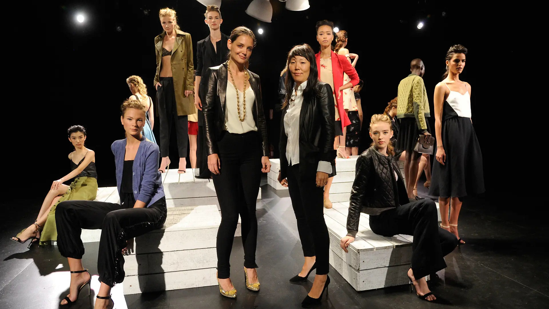 NEW YORK, NY - SEPTEMBER 12: Katie Holmes, Jeanne Yang and models rehearse for the Holmes & Yang presentation during Spring 2013 Mercedes-Benz Fashion Week at The Box at Lincoln Center on September 12, 2012 in New York City. (Photo by Kevin Mazur/Getty Images)