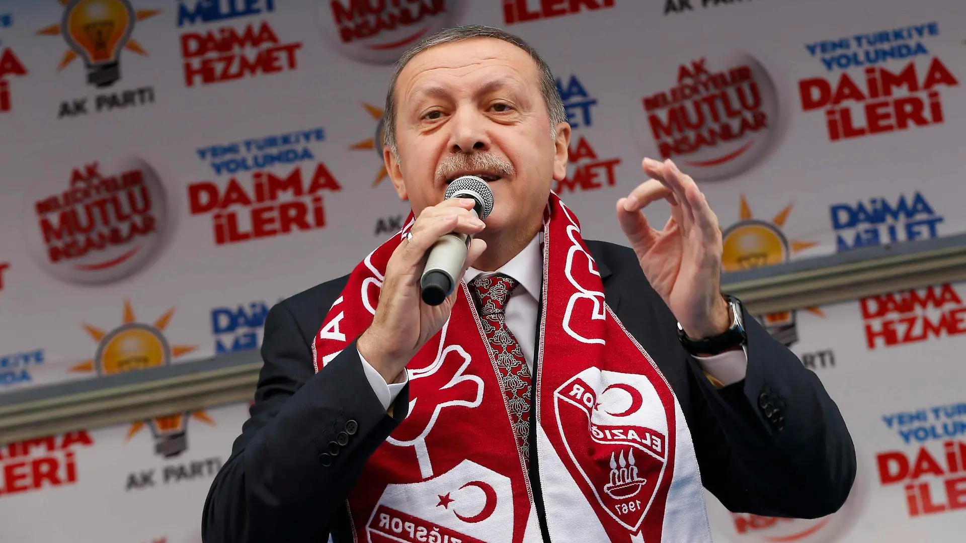 Turkey's Prime Minister Tayyip Erdogan addresses his supporters during an election rally of his ruling AK Party in Elazig March 6, 2014. Turkey will hold municipal elections on March 30. REUTERS/Umit Bektas (TURKEY - Tags: POLITICS ELECTIONS)