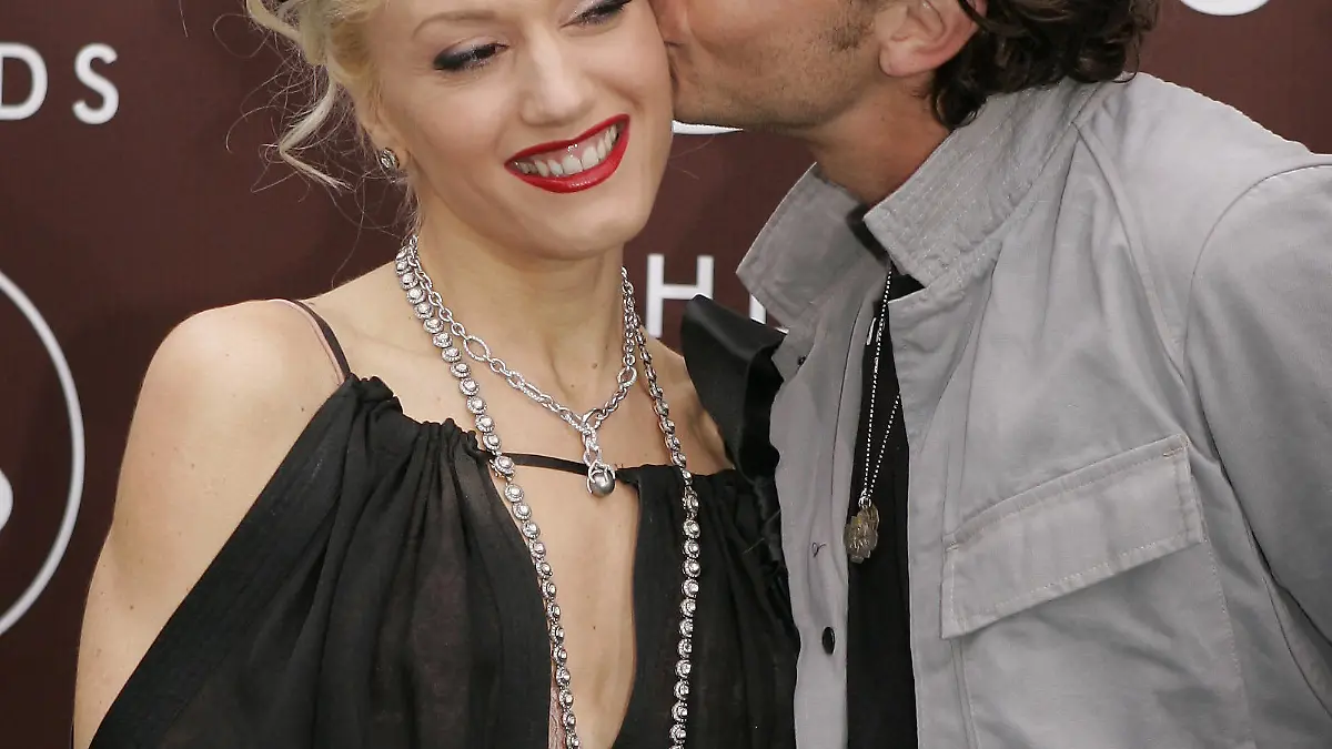 Gwen Stefani, left, nominated in two categories, is joined by husband Gavin Rossdale as she arrives for the 47th Annual Grammy Awards Sunday, Feb. 13, 2005, at the Staples Center in Los Angeles. (AP Photo/Mark J. Terrill)