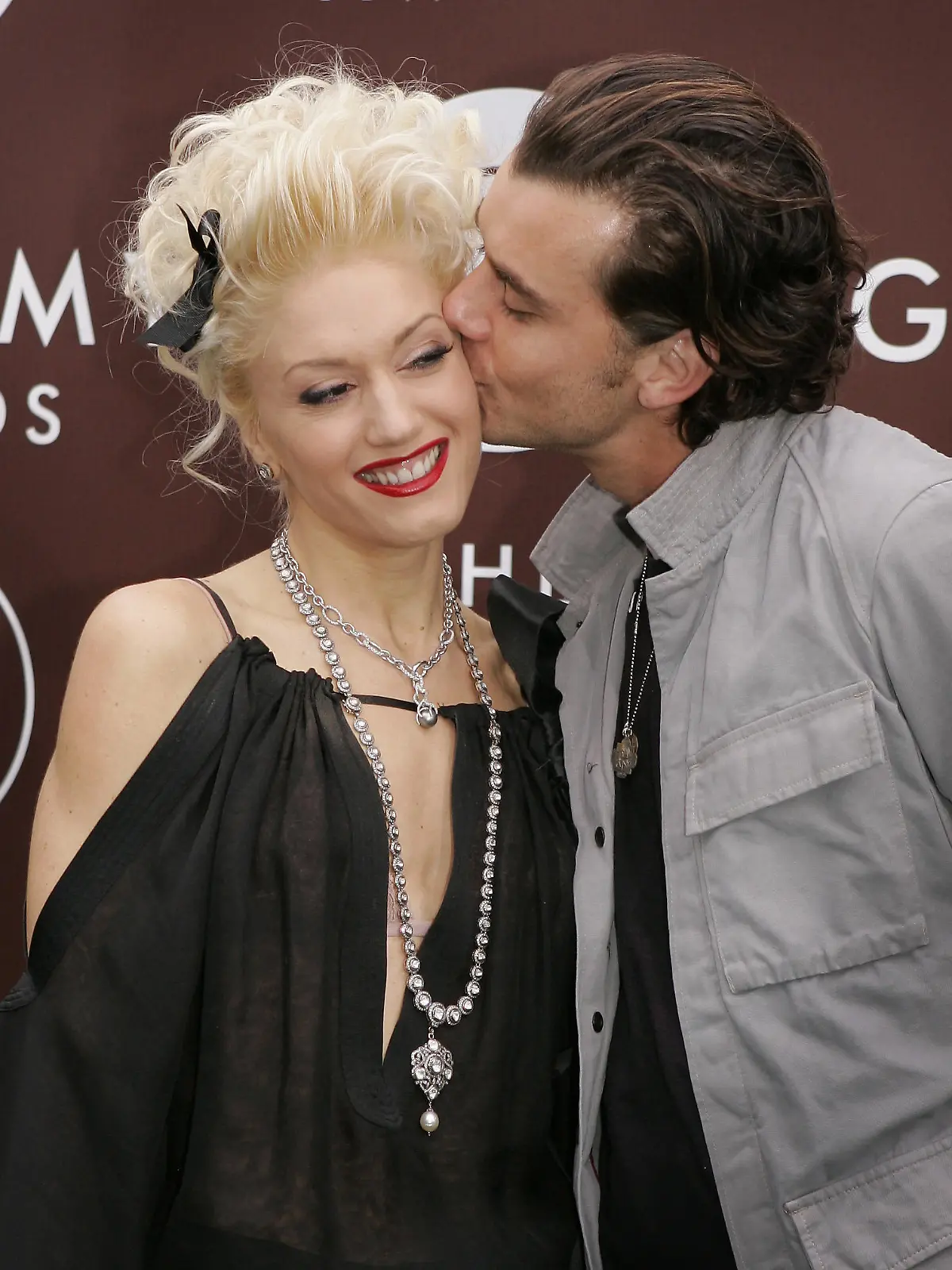 Gwen Stefani, left, nominated in two categories, is joined by husband Gavin Rossdale as she arrives for the 47th Annual Grammy Awards Sunday, Feb. 13, 2005, at the Staples Center in Los Angeles. (AP Photo/Mark J. Terrill)