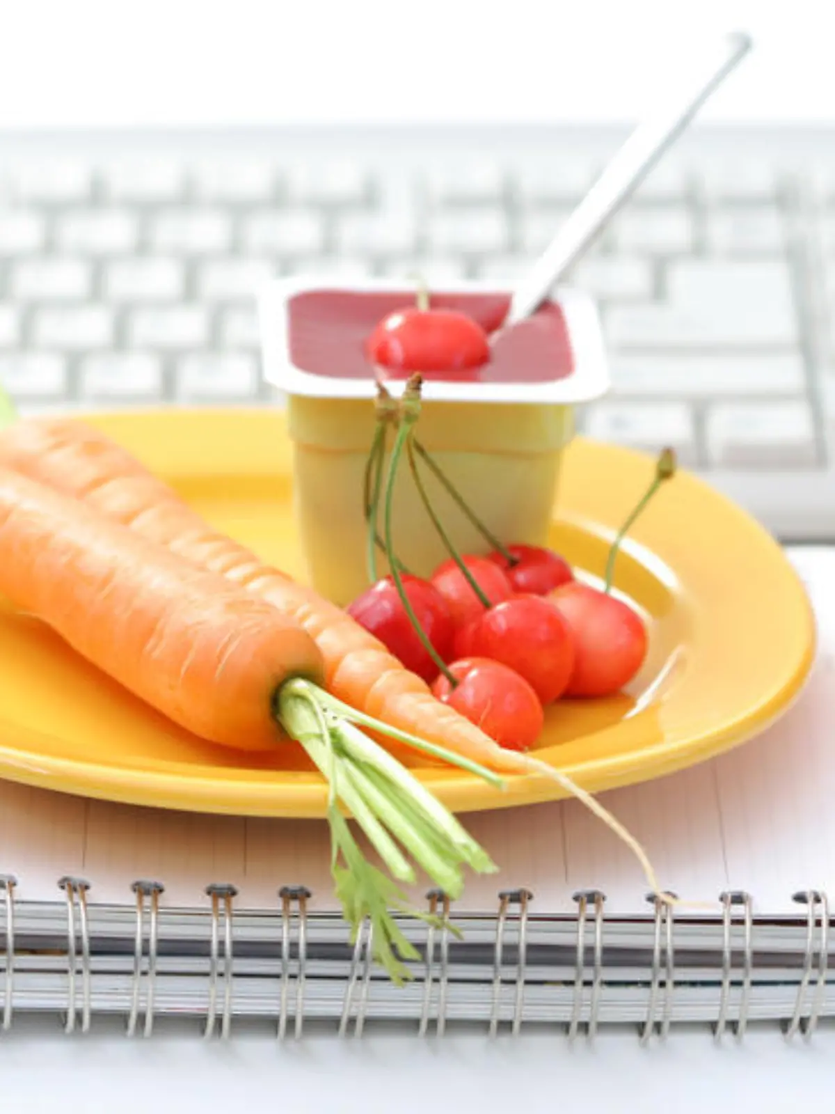 healthy snack in the office - yogurt and fresh fruits and vegetables