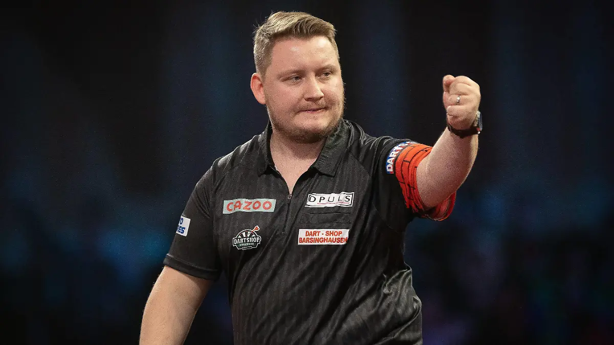  Darts PDC World Darts Championship Martin Schindler Germany reacts, celebrates in his Second Round match against Martin Lukeman England not in picture during the PDC World Darts Championship at Alexandra Palace, London, United Kingdom on 23 December 2022. London Alexandra Palace London United Kingdom Editorial use only PUBLICATIONxNOTxINxUK , Copyright: xIanxStephenx PSI-16516-0025