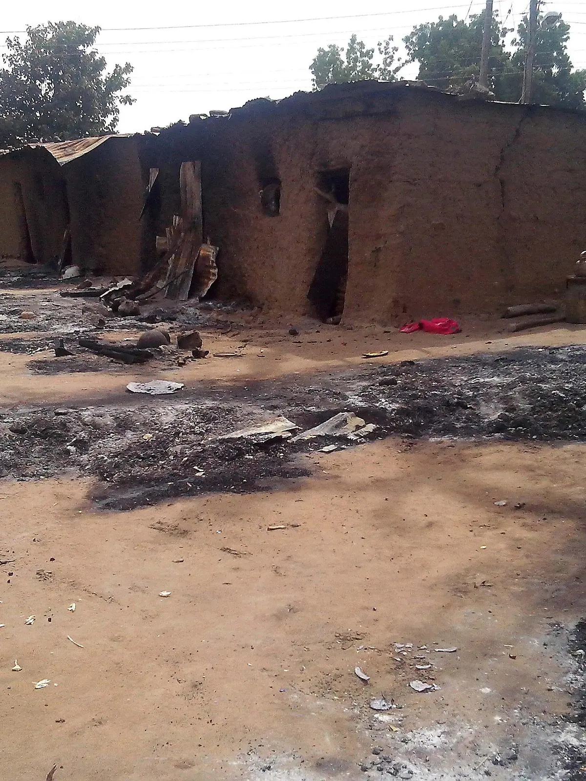 epa04100296 (FILE) A file photograph dated 28 January 2013 showing the remains of houses after a Boko Haram attack, killing 70 people, in Kawuri, Nigeria. Reports on 25 February 2014 state that suspected Islamist militants attacked a school 25 February 2014 and killed 43 people in north-eastern Nigeria, local officials and hospital sources said. More than 50 gunmen thought to belong to the Boko Haram group stormed the school in Buni Yadi in Yobe state in the early morning, a member of the school committee said. The attackers kicked open the doors of buildings where students were sleeping. They slit the throats of many of them, avoiding the use of firearms in order not to attract the attention of security personnel manning a checkpoint nearby. EPA/STRINGER +++(c) dpa - Bildfunk+++