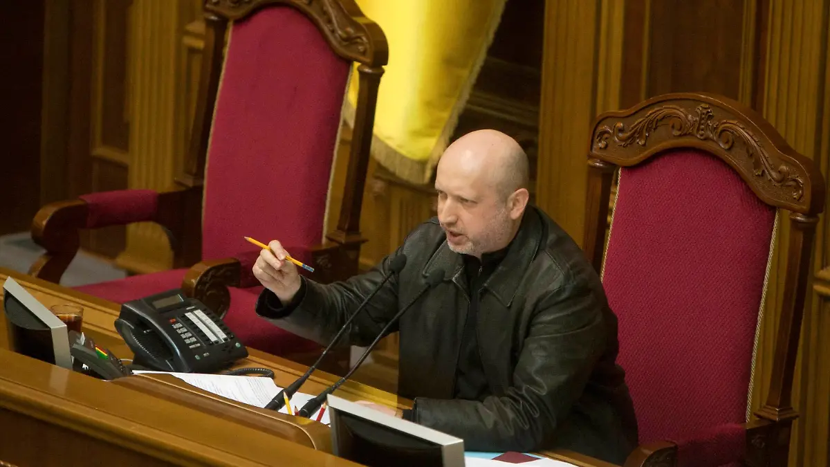Newly elected speaker of parliament Oleksander Turchynov attends a session of the Ukrainian parliament in Kiev February 22, 2014. Protesters seized the Kiev office of President Viktor Yanukovich on Saturday and the opposition demanded a new election be held by May, as the pro-Russian leader's grip on power rapidly eroded following bloodshed in the capital. The speaker of parliament, a Yanukovich loyalist, resigned and parliament on Saturday elected Oleksander Turchynov, a close ally of Tymoshenko, as his replacement. REUTERS/Alex Kuzmin (UKRAINE - Tags: POLITICS CIVIL UNREST)