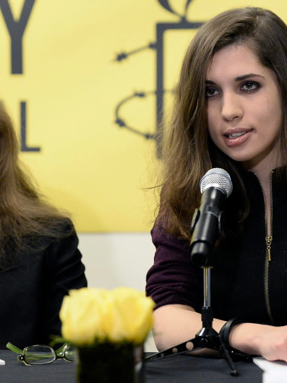 epa04085141 (FILE) A file photo dated 04 February 2014 showing Maria Alyokhina (L) and Nadezhda Tolokonnikova (R) members of the Russian feminist 'Pussy Riot' punk group members, at a press conference at Amnesty International offices in New York, New York, USA, 04 February 2014. Reports on 18 February 2014 state Pussy Riot members Nadya Tolokonnikova and Maria Alyokhina saying that they have been arrested by police in Sochi, Russia. EPA/ANDREW GOMBERT +++(c) dpa - Bildfunk+++