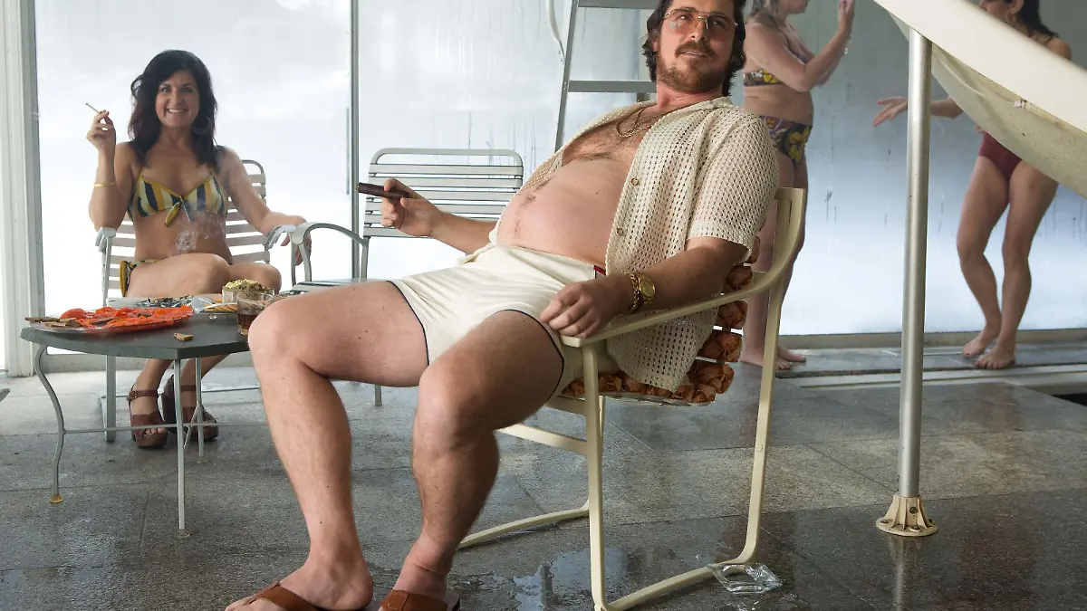 Irving Rosenfeld (Christian Bale) at Pool Party in Columbia Pictures' AMERICAN HUSTLE.