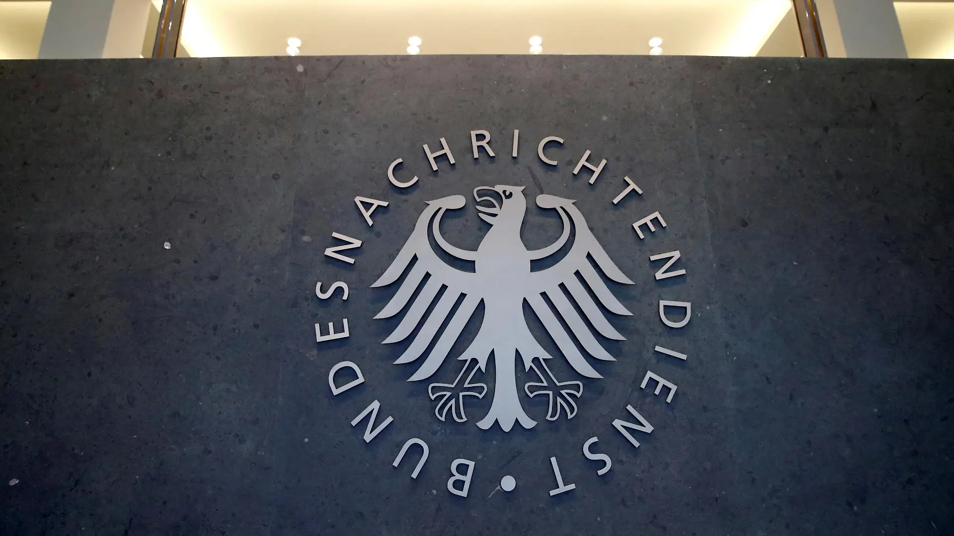 FILE PHOTO: A sign of the headquarters of the Bundesnachrichtendienst (BND), Germany's Federal Intelligence Service, is seen in Berlin, Germany, February 8, 2019. REUTERS/Axel Schmidt/File Photo