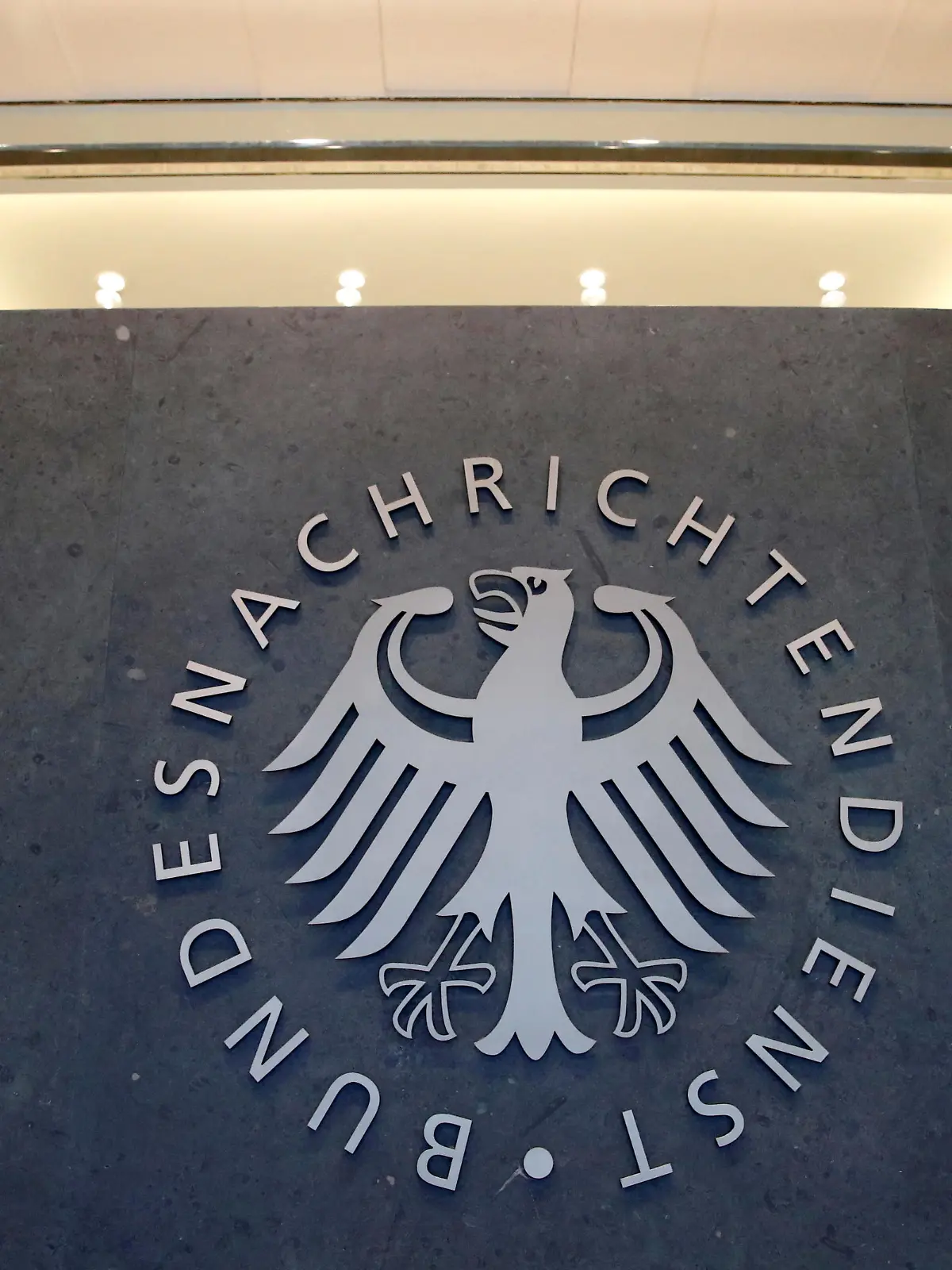 FILE PHOTO: A sign of the headquarters of the Bundesnachrichtendienst (BND), Germany's Federal Intelligence Service, is seen in Berlin, Germany, February 8, 2019.    REUTERS/Axel Schmidt/File Photo