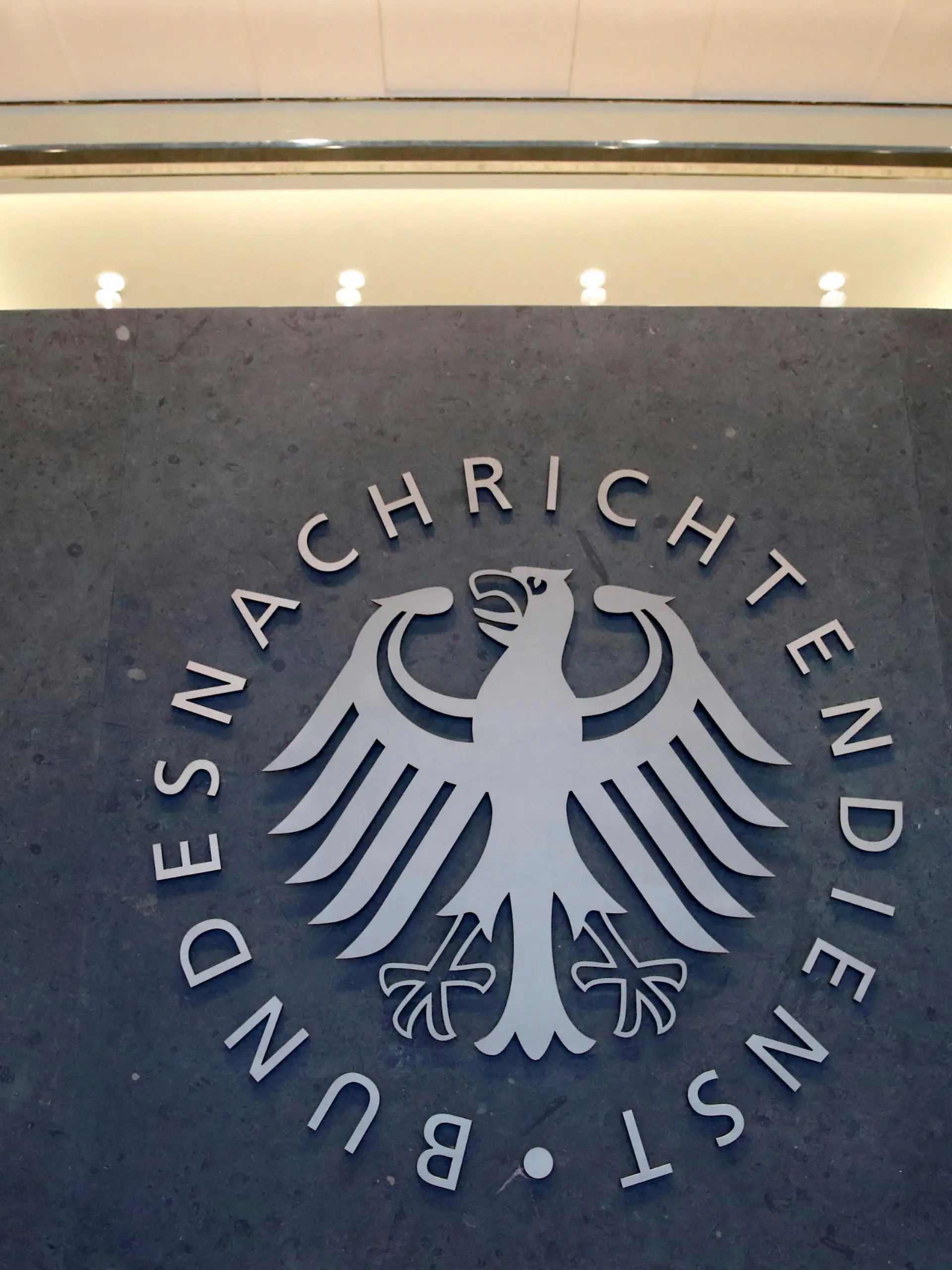 FILE PHOTO: A sign of the headquarters of the Bundesnachrichtendienst (BND), Germany's Federal Intelligence Service, is seen in Berlin, Germany, February 8, 2019.    REUTERS/Axel Schmidt/File Photo