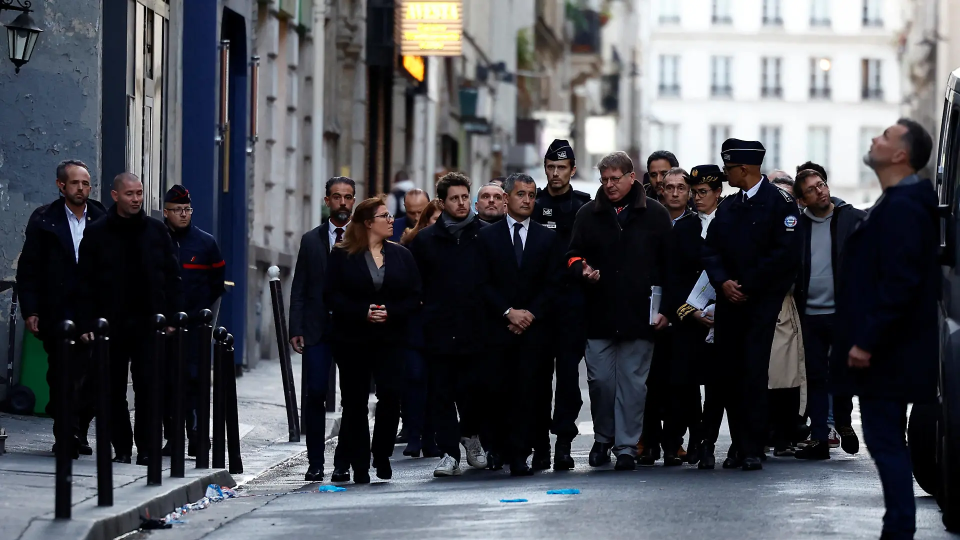 French Interior Minister Gerald Darmanin walks on Rue d'Enghien after gunshots were fired killing and injuring several people in a central district of Paris, France, December 23, 2022. REUTERS/Sarah Meyssonnier