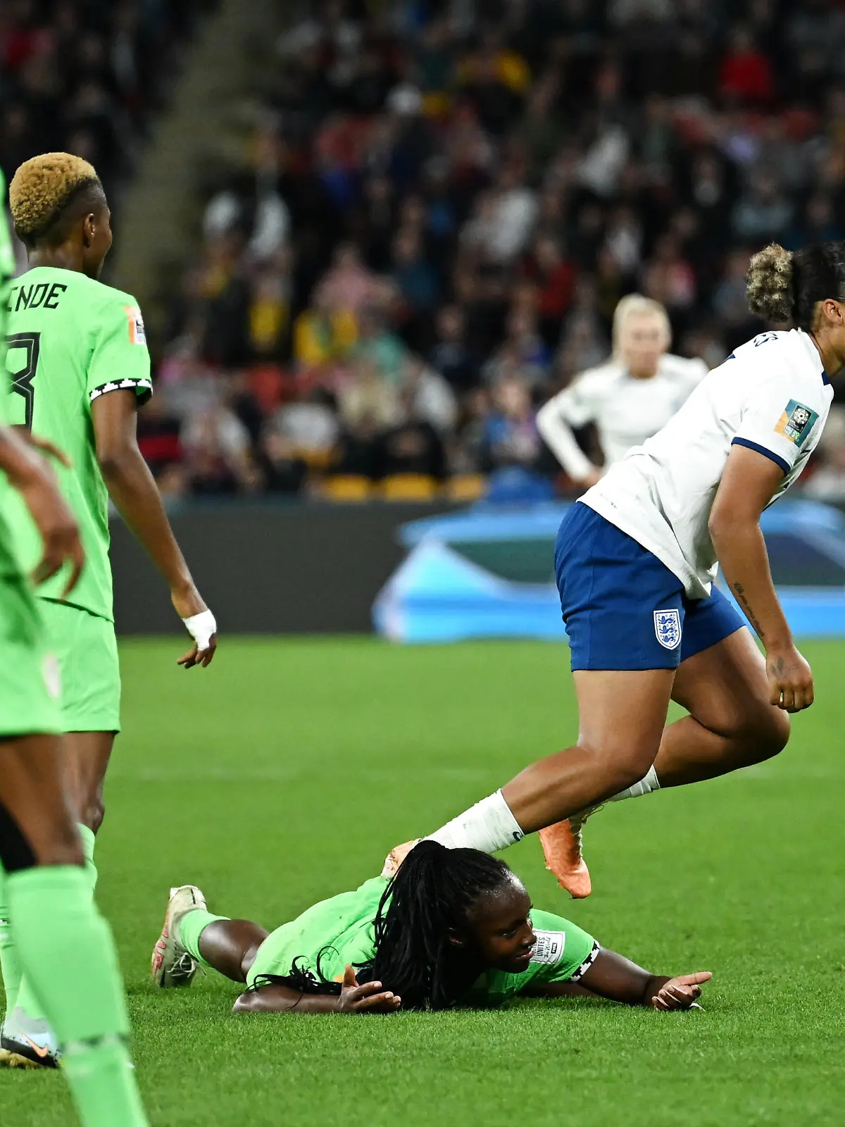 (230807) -- BRISBANE, Aug. 7, 2023 (Xinhua) -- England's Lauren James (R) fouls Nigeria's Michelle Alozie during the round of 16 match between England and Nigeria at the 2023 FIFA Women's World Cup in Brisbane, Australia, Aug. 7, 2023. (Xinhua/Li Yibo)