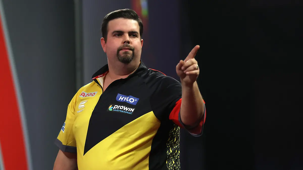 LONDON, ENGLAND - DECEMBER 21: Gabriel Clemens of Germany reacts during his Second Round Match against William O'Connor of Ireland during Day Seven of The  Cazoo World Darts Championship at Alexandra Palace on December 21, 2022 in London, England. (Photo by Luke Walker/Getty Images)