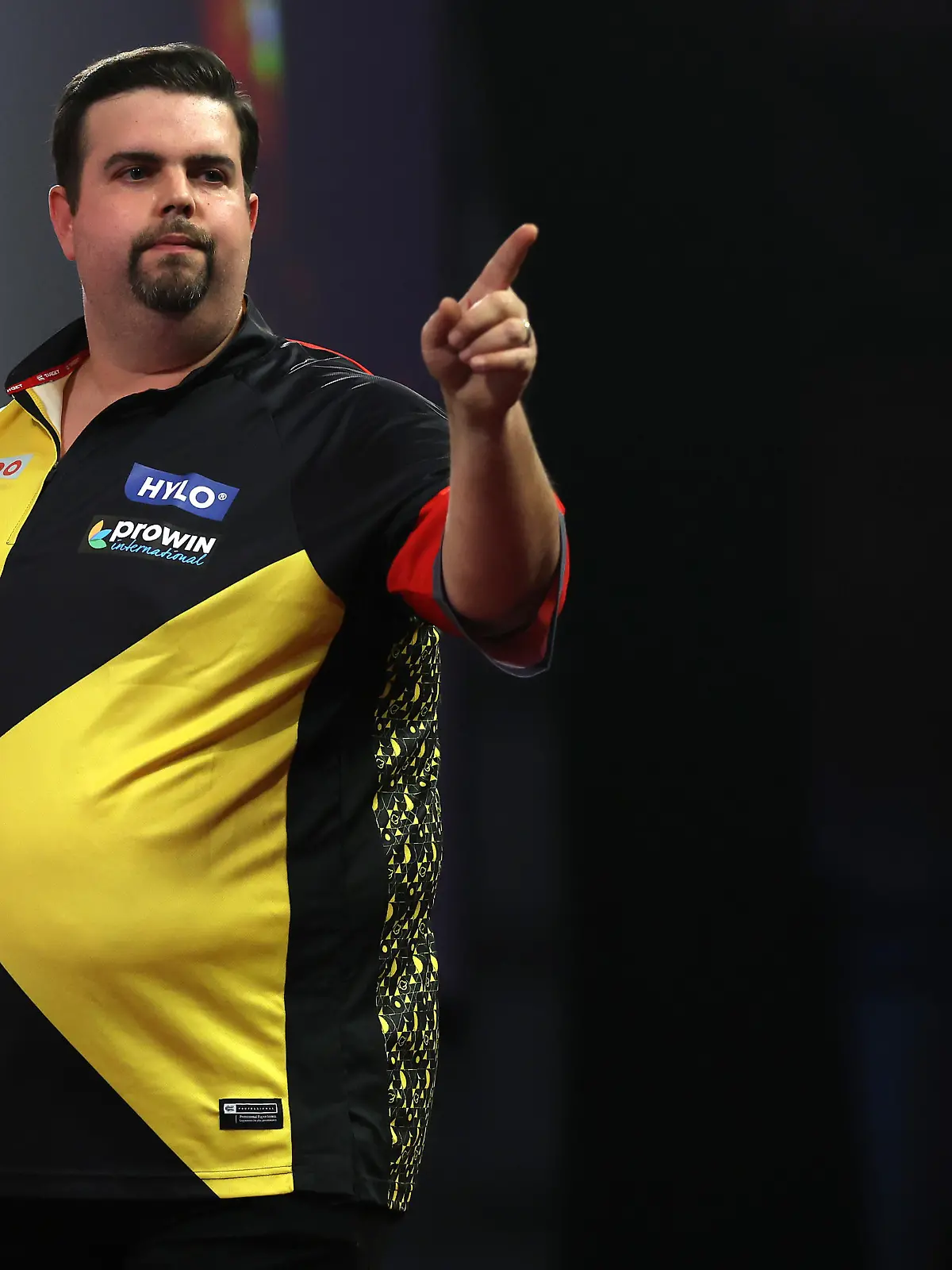 LONDON, ENGLAND - DECEMBER 21: Gabriel Clemens of Germany reacts during his Second Round Match against William O'Connor of Ireland during Day Seven of The  Cazoo World Darts Championship at Alexandra Palace on December 21, 2022 in London, England. (Photo by Luke Walker/Getty Images)