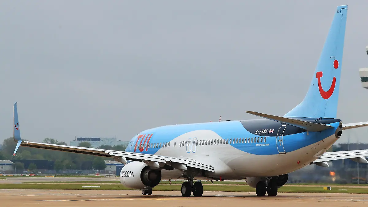Coronavirus - Mon May 17, 2021. A TUI flight leaves for Funchai, on the Portuguese island of Madeira, from Gatwick Airport in West Sussex after the ban on international leisure travel for people in England was lifted following the further easing of lockdown restrictions. Picture date: Monday May 17, 2021. See PA story HEALTH Reopening Holidays. Photo credit should read: Gareth Fuller/PA Wire URN:59828340