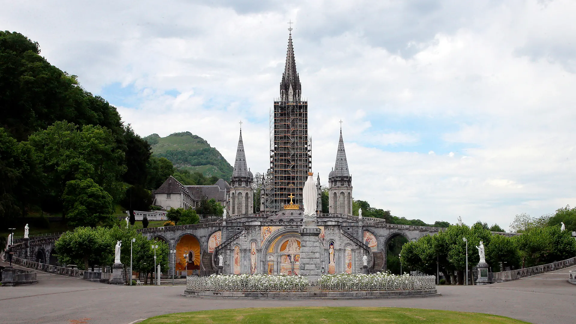 FILE - The closed Basilica of Lourdes is pictured May 8, 2020, in Lourdes, southwestern France. The Vatican came under pressure Tuesday, Dec. 6, 2022, to explain why it didn’t prosecute a famous Jesuit artist and merely let his order restrict the priest's ministry following allegations that he abused his authority over adult women. Mosiacs by Rev. Marko Ivan Rupnik decorate several churches and chapels, including the Lourdes basilica. (AP Photo/Bob Edme, File)