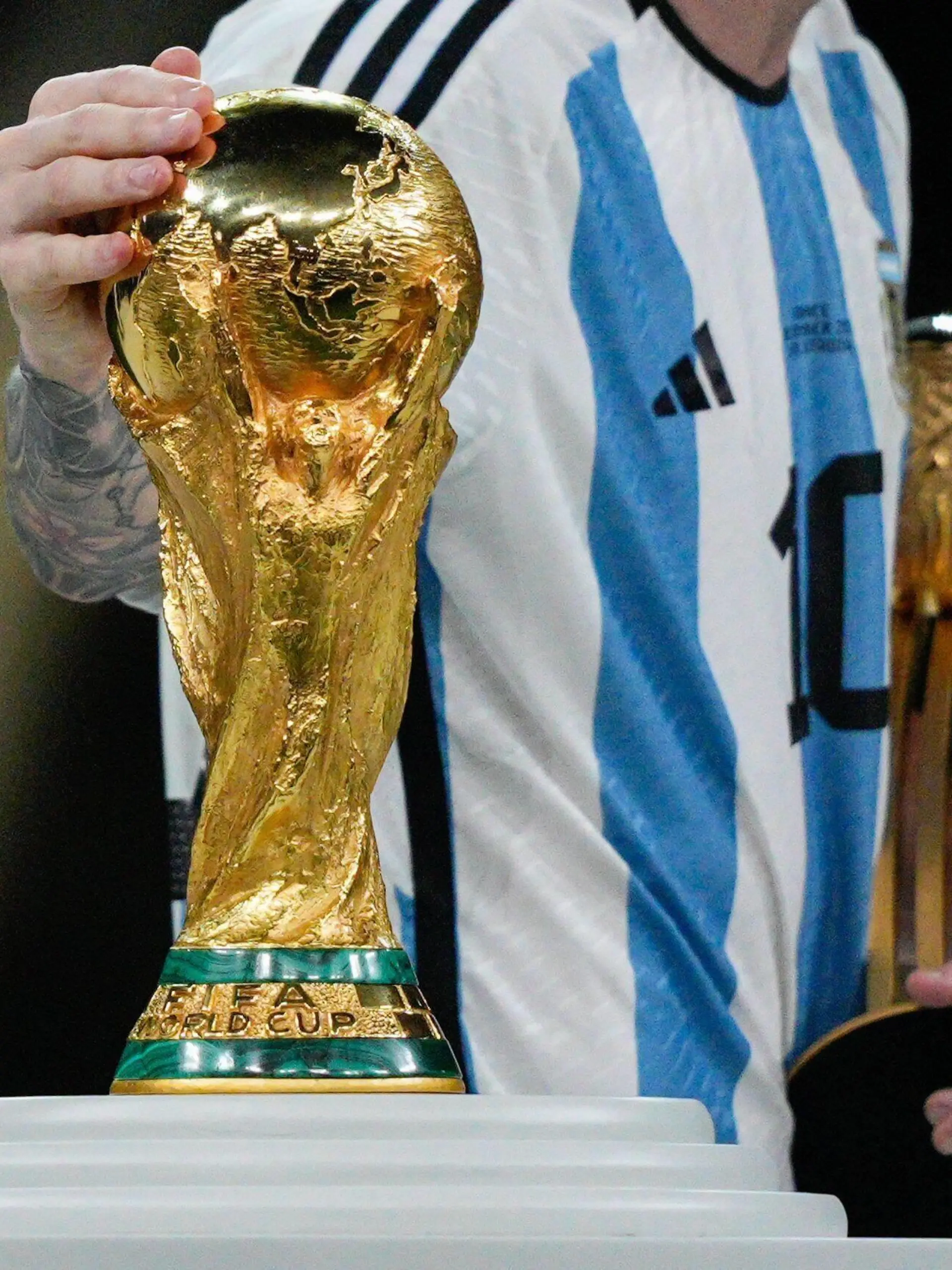  Mandatory Credit: Photo by Dave Shopland/Shutterstock 13670813dv Lionel Messi of Argentina strokes the FIFA World Cup, WM, Weltmeisterschaft, Fussball trophy as he collects the Golden Ball Award Argentina v France, FIFA World Cup 2022, Final, Football, Lusail Stadium, Al Daayen, Qatar - 18 Dec 2022 Editorial Use Only Argentina v France, FIFA World Cup 2022, Final, Football, Lusail Stadium, Al Daayen, Qatar - 18 Dec 2022 Editorial Use Only PUBLICATIONxINxGERxSUIxAUTxHUNxGRExMLTxCYPxROUxBULxUAExKSAxONLY Copyright: xDavexShopland/Shutterstockx 13670813dv