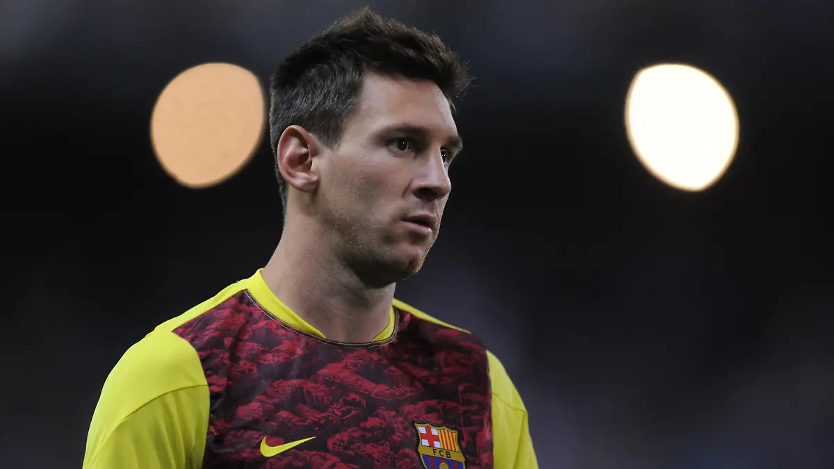 MADRID, SPAIN - AUGUST 21: Leo Messi of Barcelona warms up before the start of the Spanish Super Cup first leg match between Atletico de Madrid and Barcelona at Vicente Calderon Stadium on August 21, 2013 in Madrid, Spain. (Photo by Denis Doyle/Getty Images)