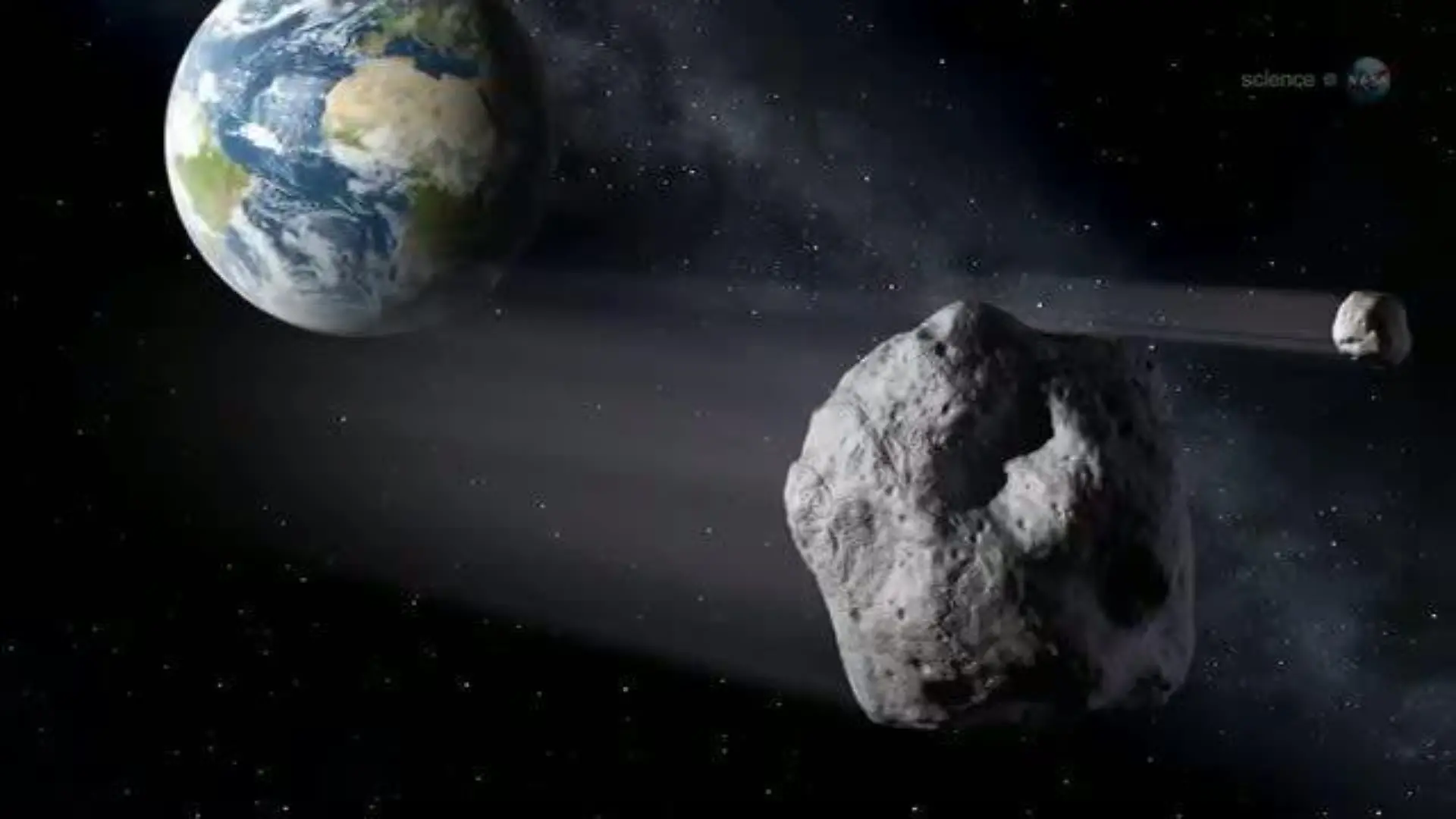 HANDOUT - Der Erde steht eine Rekordbegegnung mit einem Asteroiden bevor: Am 15. Februar 2013 wird der Asteroid 2012 DA14 knapp an der Erde vorbeischrammen, wie die US-Raumfahrtbehörde Nasa berichtet (undatierte Video-Illustration). Der Asteroid 2012 DA14 nähert sich bis auf knapp 28 000 Kilometer und kreuzt dabei sogar die Bahn zahlreicher Kommunikations- und Erdbeobachtungssatelliten. Eine Kollision schließt die Nasa aus. Foto: NASA /Science dpa +++(c) dpa - Bildfunk+++