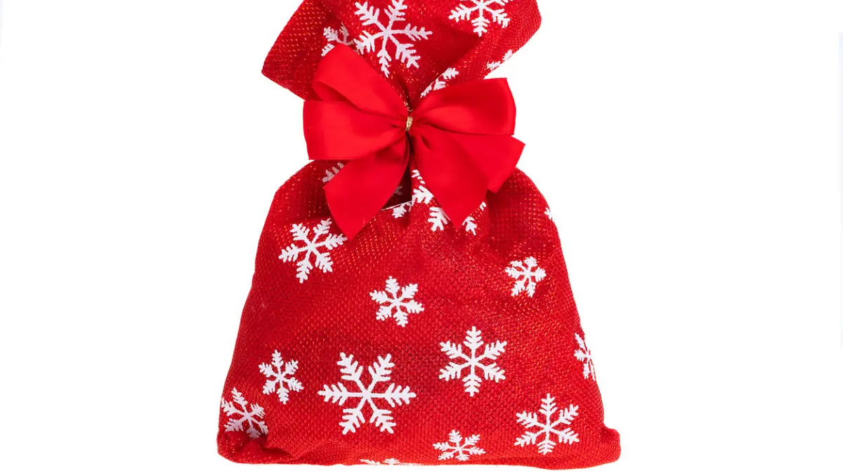 christmas bag with gifts isolated on white background