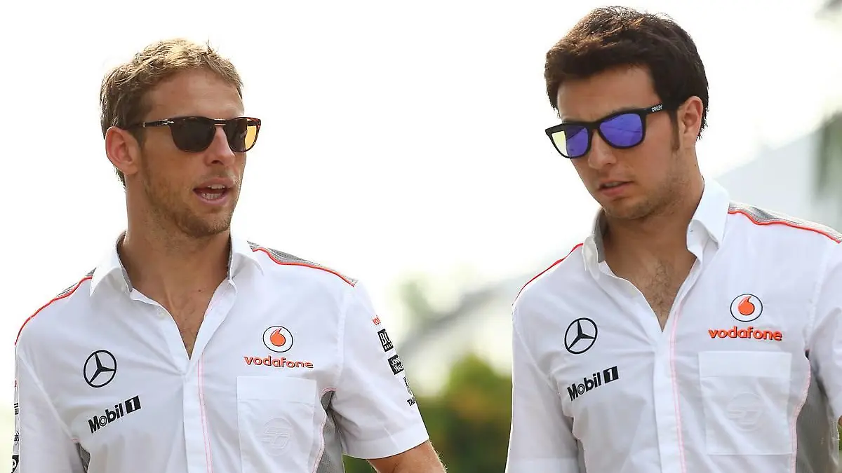 (L to R): Jenson Button (GBR) McLaren with team mate Sergio Perez (MEX) McLaren.22.03.2013. Formula 1 World Championship, Rd 2, Malaysian Grand Prix, Sepang, Malaysia, Friday. - www.xpbimages.com, EMail: requests@xpbimages.com - copy of publication required for printed pictures. Every used picture is fee-liable. © Copyright: Kalisz / XPB Images