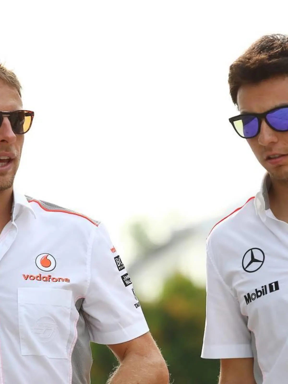 (L to R): Jenson Button (GBR) McLaren with team mate Sergio Perez (MEX) McLaren.22.03.2013. Formula 1 World Championship, Rd 2, Malaysian Grand Prix, Sepang, Malaysia, Friday. - www.xpbimages.com, EMail: requests@xpbimages.com - copy of publication required for printed pictures. Every used picture is fee-liable. © Copyright: Kalisz / XPB Images