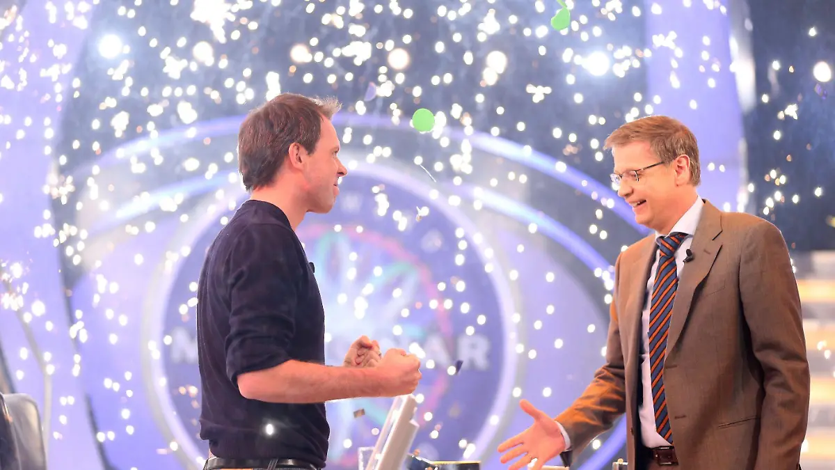 Günther Jauch mit Sebastian Langrock aus München