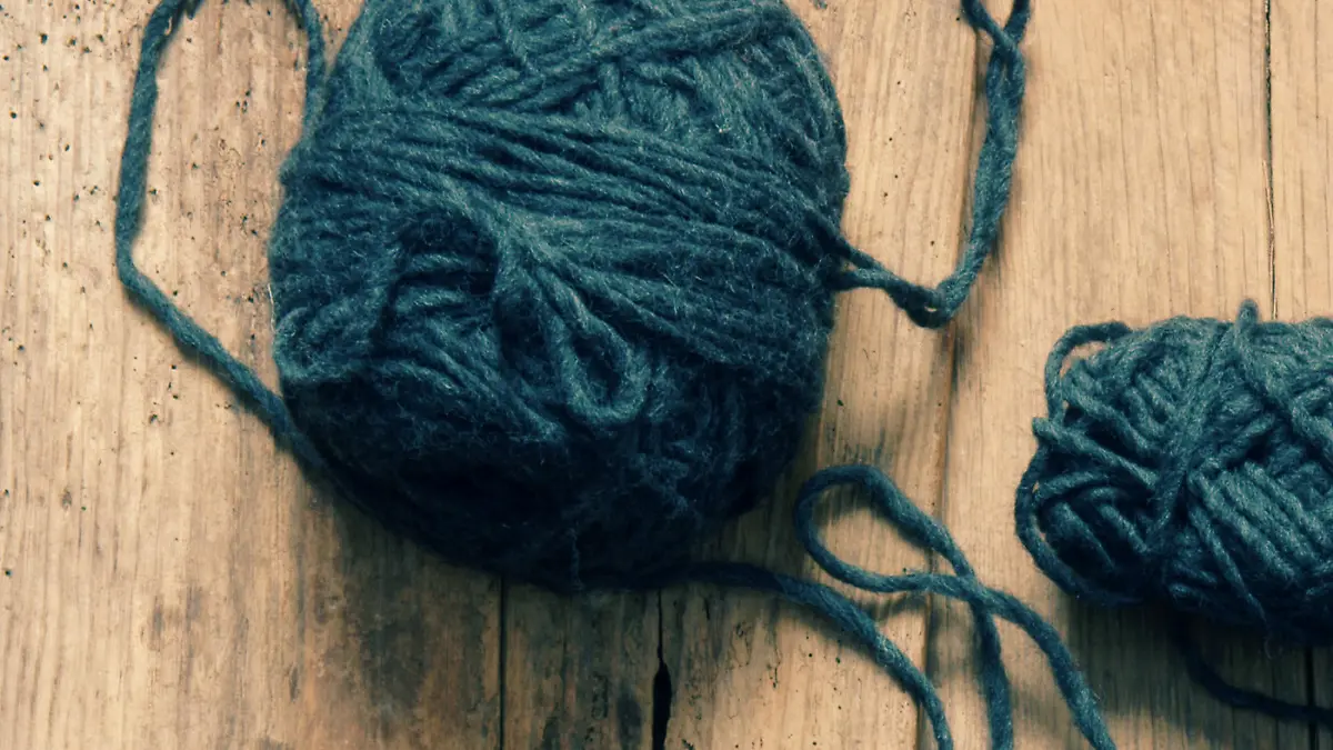 Handmade gift for special day as mother day, father day, valentine day or wintertime, heap of ball of wool to knit colorful scarf for cold day, knitting to make meaningful present