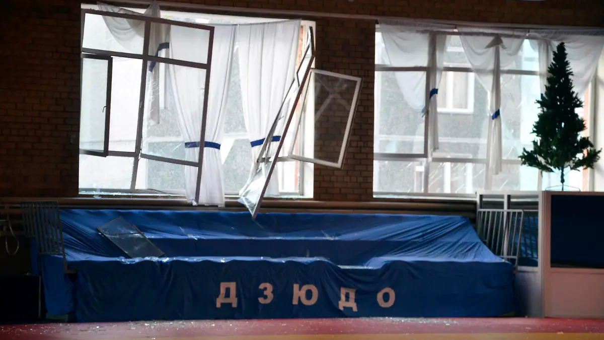 Broken windows and debris are seen inside a sports hall following sightings of a falling object in the sky in the Urals city of Chelyabinsk February 15, 2013. A powerful blast rocked the Russian region of the Urals early on Friday with bright objects, identified as possible meteorites, falling from the sky, emergency officials said. REUTERS/OOO Spetszakaz (RUSSIA - Tags: ENVIRONMENT)