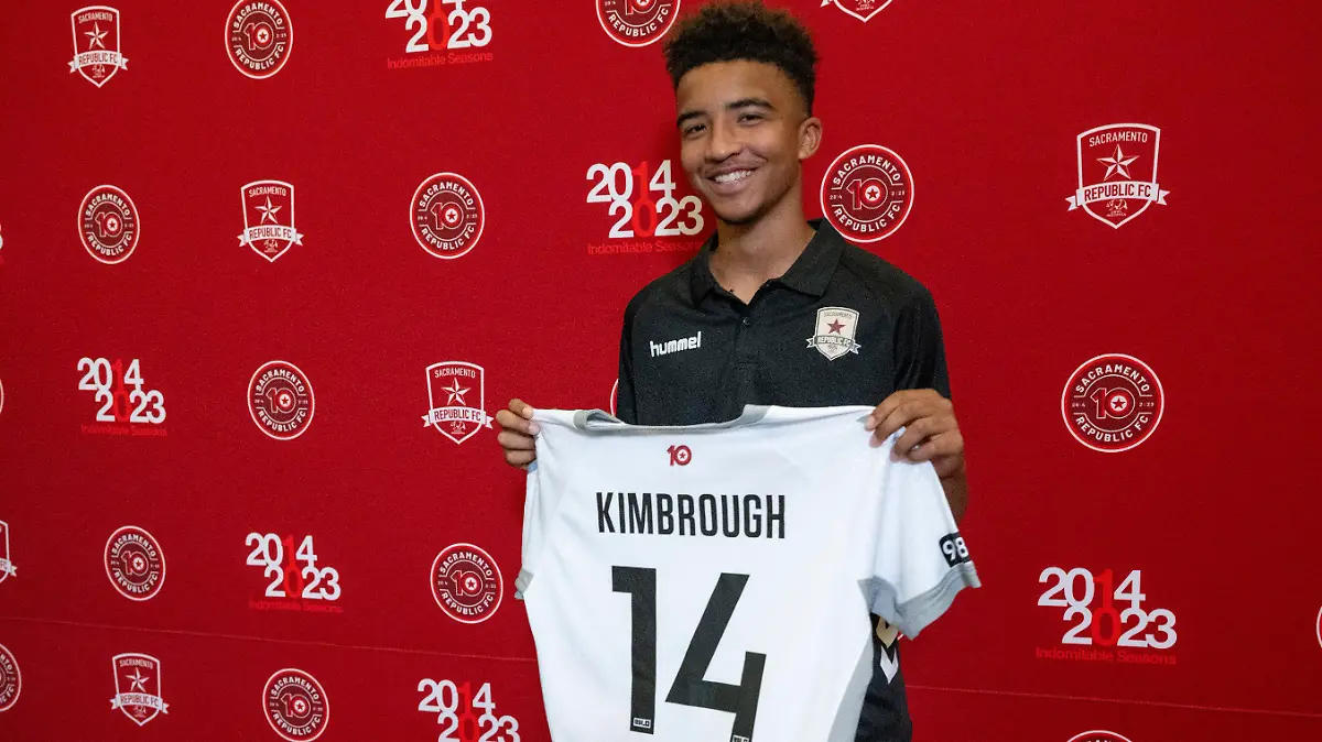 Da'vian Kimbrough, 13, holds up his jersey after signing contract with the Sacramento Republic of the second-tier League Championship of the United Soccer League, Tuesday, Aug. 8, 2023, in Sacramento, Calif. (Paul Kitagaki Jr./The Sacramento Bee via AP)