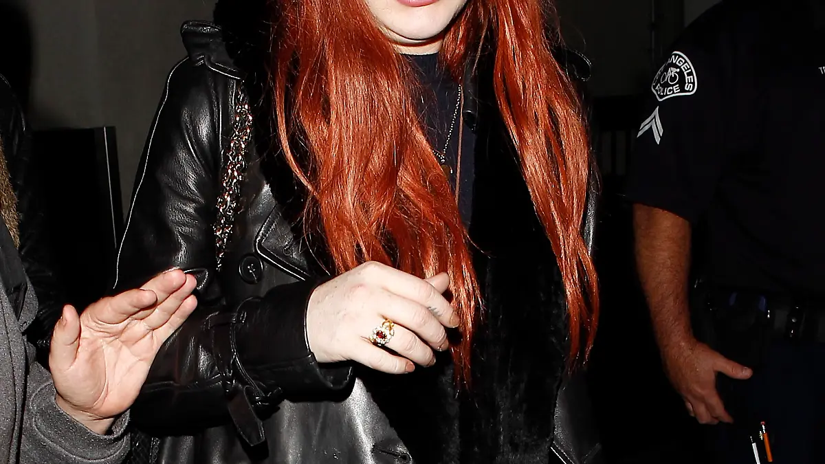 Lindsay Lohan arriving at LAX from NY for another court appearance.