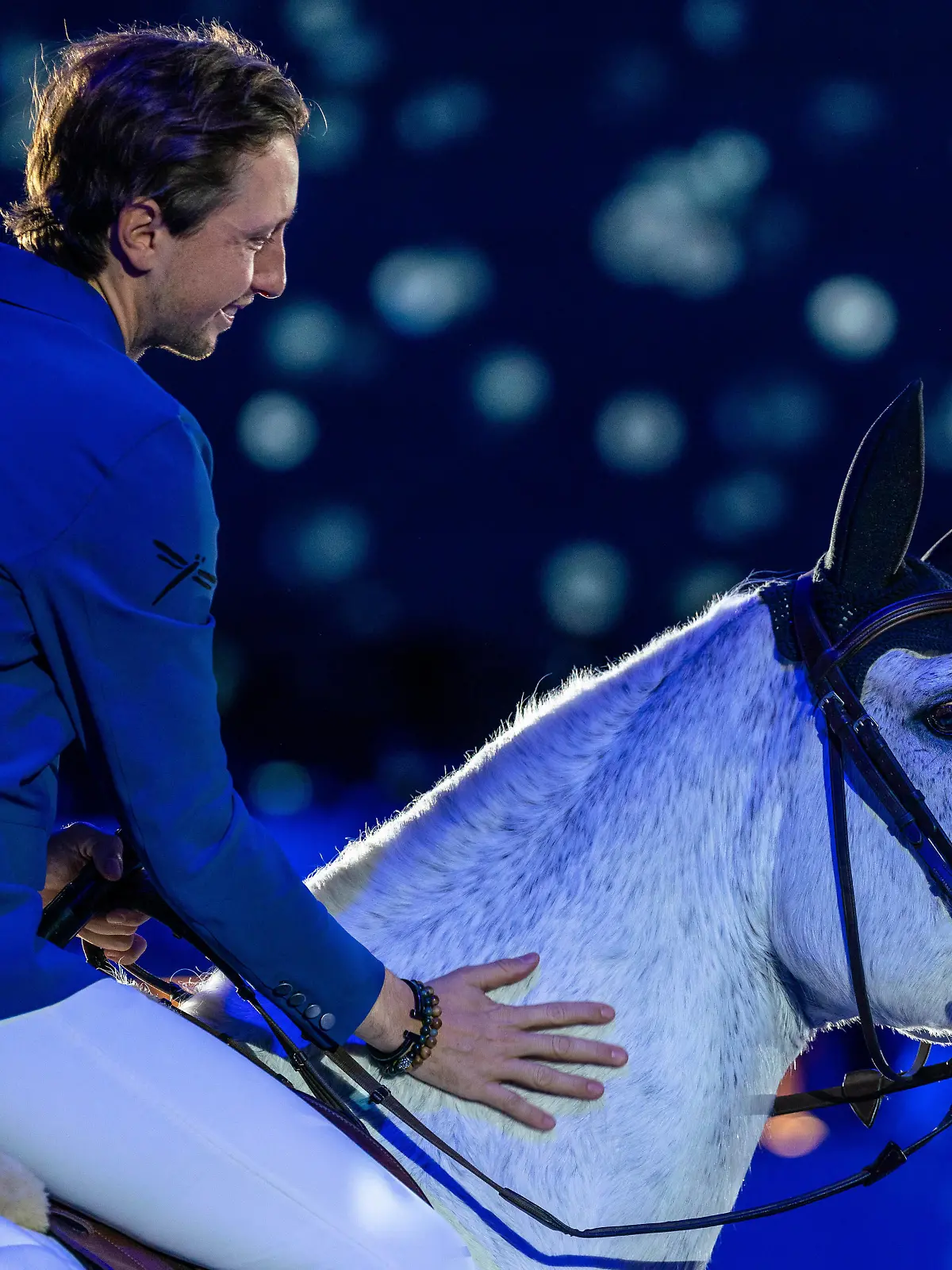  December 11, 2022, Geneva, Switzerland: Swiss showjumper MARTIN FUCHS, on Clooney 51, celebrated in an official retirement ceremony before the start of the Rolex Grand Prix at the CHI Geneva 2022, 16 months after suffering a career-ending injury. Geneva Switzerland - ZUMAs230 20221211_znp_s230_006 Copyright: xCorinexScibozx