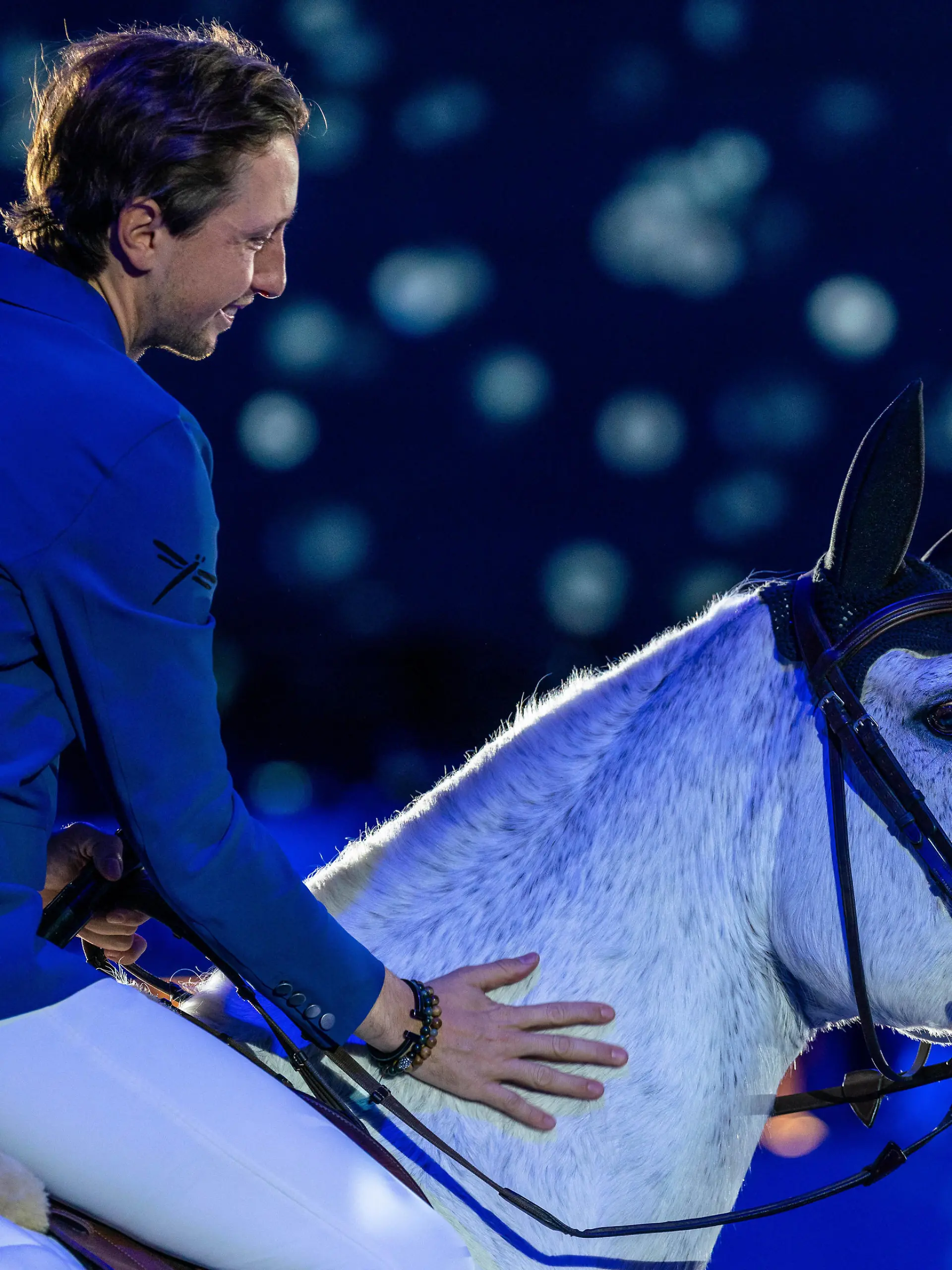  December 11, 2022, Geneva, Switzerland: Swiss showjumper MARTIN FUCHS, on Clooney 51, celebrated in an official retirement ceremony before the start of the Rolex Grand Prix at the CHI Geneva 2022, 16 months after suffering a career-ending injury. Geneva Switzerland - ZUMAs230 20221211_znp_s230_006 Copyright: xCorinexScibozx
