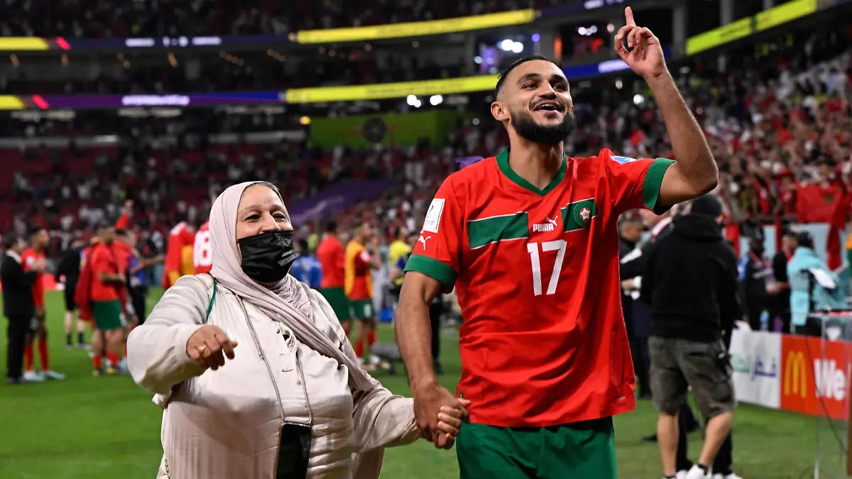 RECORD DATE NOT STATED  FIFA World Cup, WM, Weltmeisterschaft, Fussball Qatar 2022 Morocco vs Portugal CF Sofiane Boufal of Morocco With Mother during the game Morocco vs Portugal, corresponding to the Quarterfinal of the FIFA World Cup Qatar 2022, at Al Thumama Stadium, Doha, on December 10, 2022. brbr Sofiane Boufal de Marruecos con su Mama durante el partido Marruecos vs Portugal, correspondiente a los cuartos de final de la Copa Mundial de la FIFA Catar 2022, en el Estadio Al Thumama, Doha, el 10 de Diciembre de 2022 DOHA DOHA QATAR PUBLICATIONxNOTxINxMEXxCHNxRUS Copyright: xJorgexMartinezx 20221210_7810 