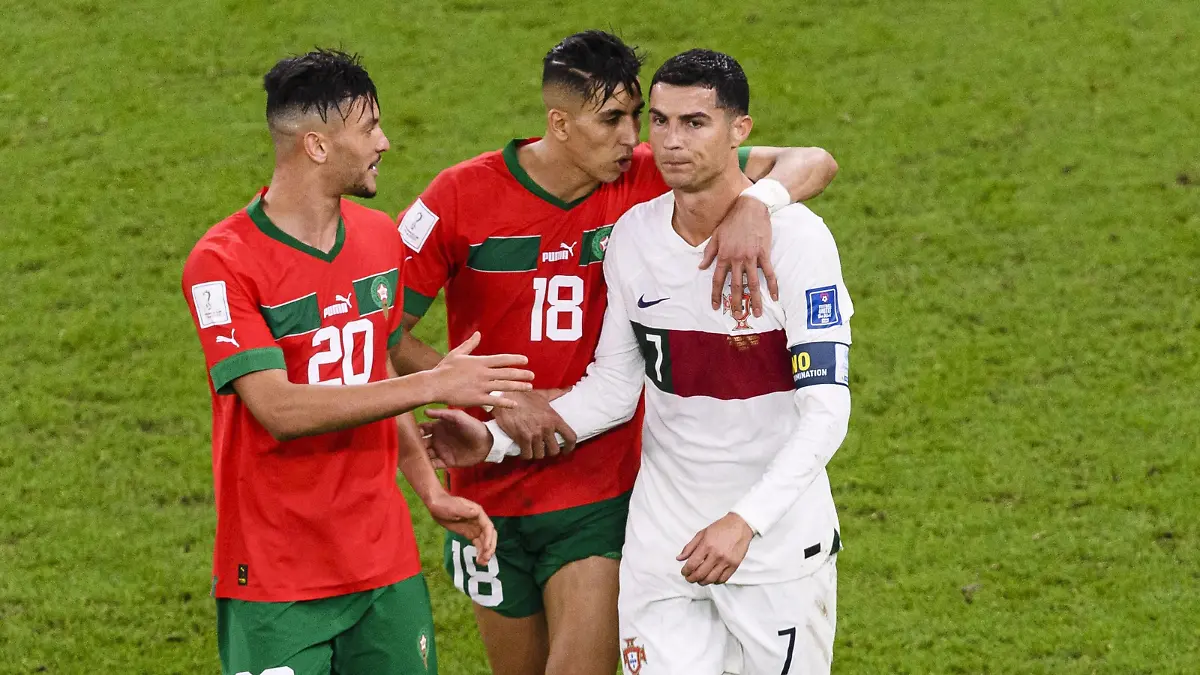 RECORD DATE NOT STATED  FIFA World Cup, WM, Weltmeisterschaft, Fussball Qatar 2022 Morocco vs Portugal CF L-R, Achraf Dari, Jawad El Yamiq of Morocco and Cristiano Ronaldo of Portugal during the game Morocco vs Portugal, corresponding to the Quarterfinal of the FIFA World Cup Qatar 2022, at Al Thumama Stadium, Doha, on December 10, 2022. brbr L-R, Achraf Dari, Jawad El Yamiq de Marruecos y Cristiano Ronaldo de Portugal durante el partido Marruecos vs Portugal, correspondiente a los cuartos de final de la Copa Mundial de la FIFA Catar 2022, en el Estadio Al Thumama, Doha, el 10 de Diciembre de 2022 DOHA DOHA QATAR PUBLICATIONxNOTxINxMEXxCHNxRUS Copyright: xMarcioxMachadox 20221210_7944 
