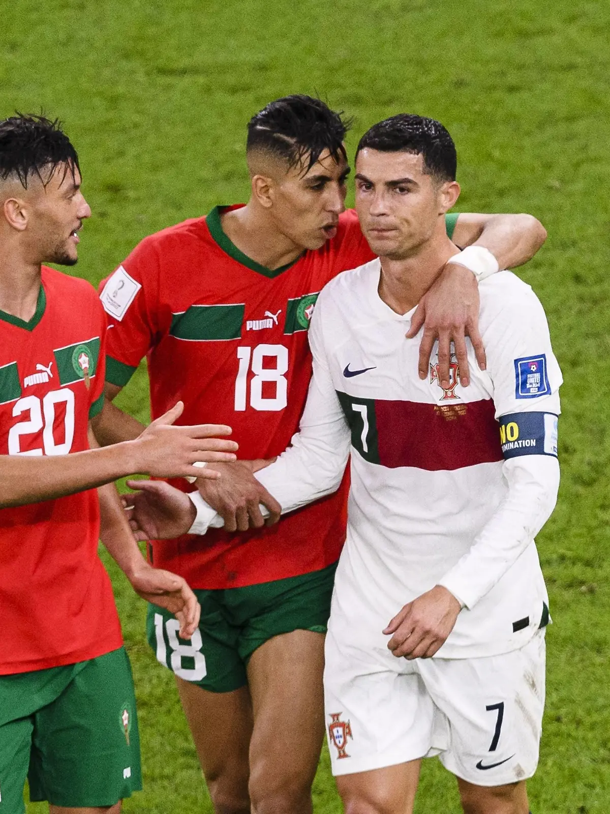 RECORD DATE NOT STATED  FIFA World Cup, WM, Weltmeisterschaft, Fussball Qatar 2022 Morocco vs Portugal CF L-R, Achraf Dari, Jawad El Yamiq of Morocco and Cristiano Ronaldo of Portugal during the game Morocco vs Portugal, corresponding to the Quarterfinal of the FIFA World Cup Qatar 2022, at Al Thumama Stadium, Doha, on December 10, 2022. brbr L-R, Achraf Dari, Jawad El Yamiq de Marruecos y Cristiano Ronaldo de Portugal durante el partido Marruecos vs Portugal, correspondiente a los cuartos de final de la Copa Mundial de la FIFA Catar 2022, en el Estadio Al Thumama, Doha, el 10 de Diciembre de 2022 DOHA DOHA QATAR PUBLICATIONxNOTxINxMEXxCHNxRUS Copyright: xMarcioxMachadox 20221210_7944 