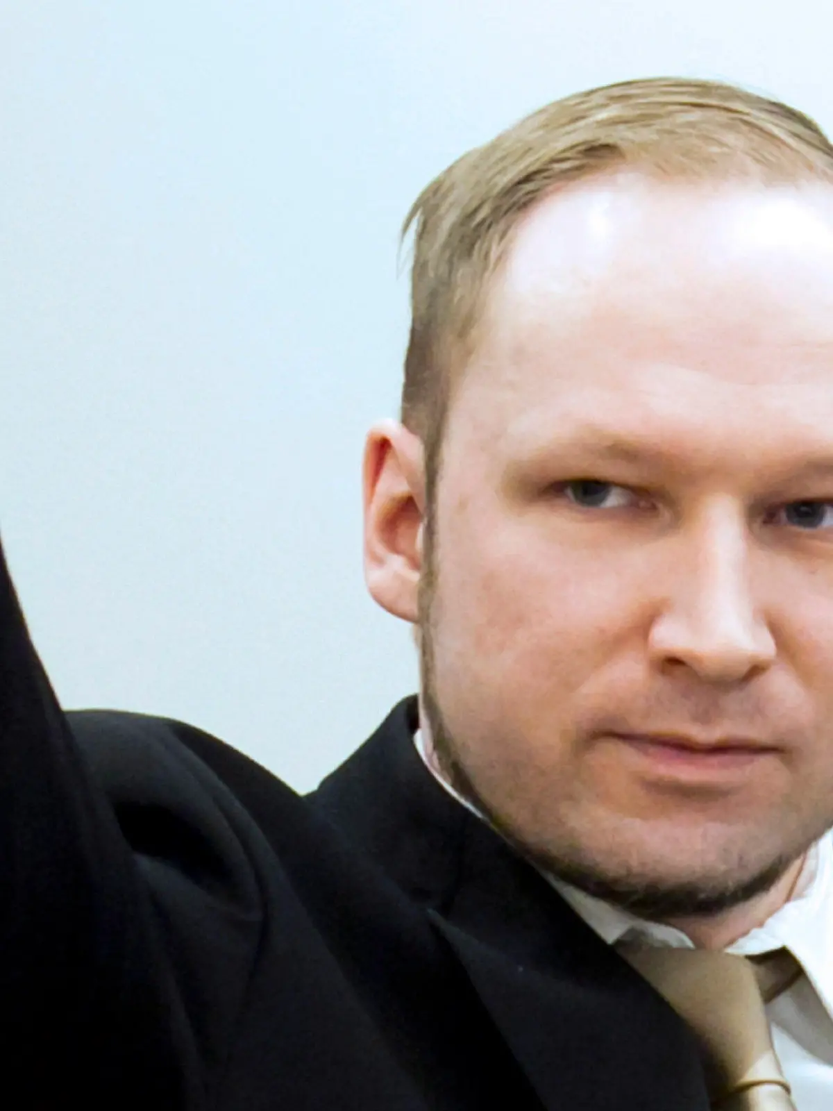 FILE - Anders Behring Breivik, who is charged with terrorism and multiple murders, makes a gesture as he arrives in court 16 April 2012. EPA/HEIKO JUNGE / POOL NORWAY OUT (zum dpa-Themenpaket Breivik-Urteil vom 19.08.2012)  +++(c) dpa - Bildfunk+++