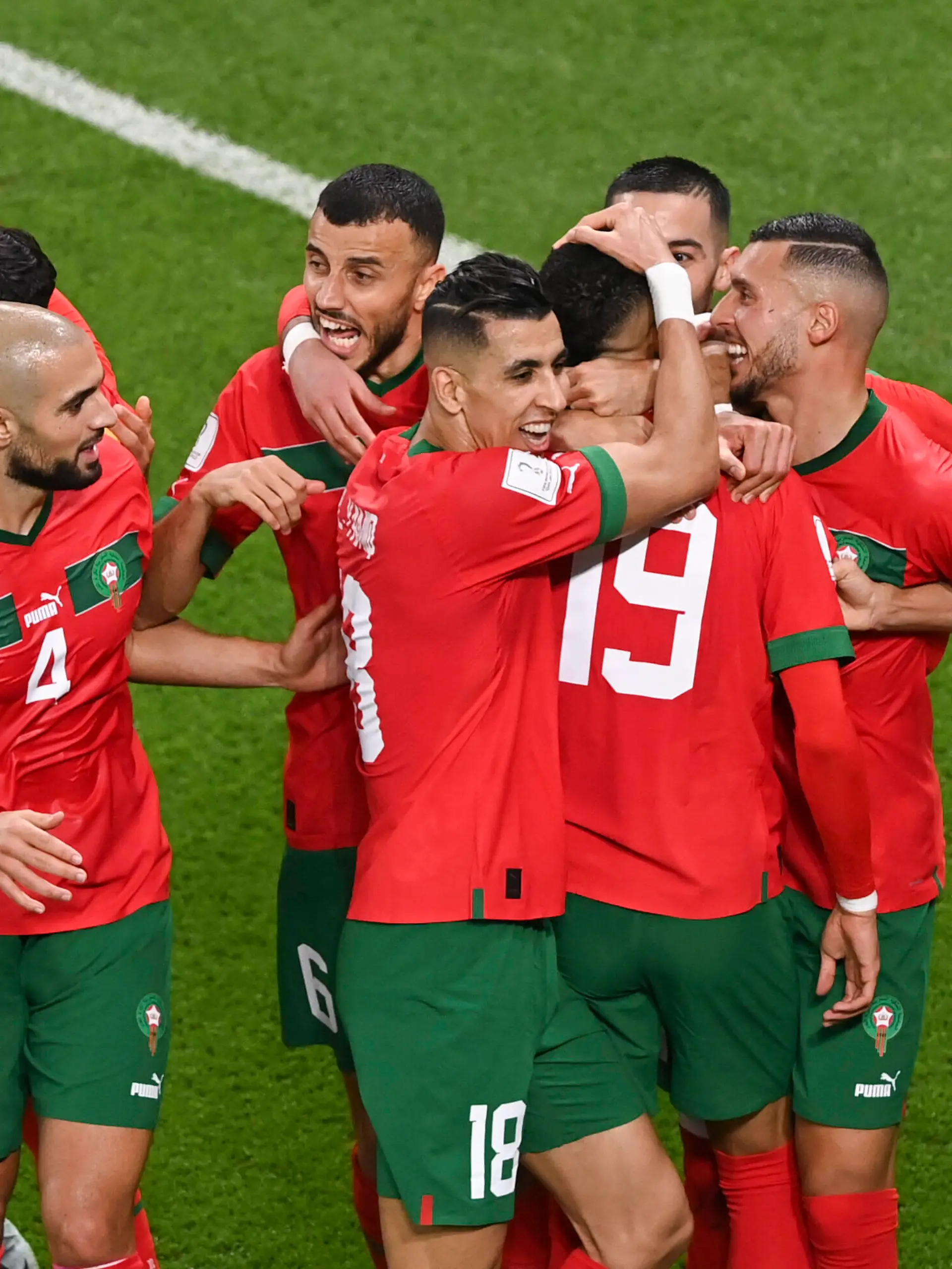  221210 -- DOHA, Dec. 10, 2022 -- Youssef En-Nesyri No. 19 of Morocco celebrates scoring during the Quarterfinal between Morocco and Portugal of the 2022 FIFA World Cup, WM, Weltmeisterschaft, Fussball at Al Thumama Stadium in Doha, Qatar, Dec. 10, 2022.  SPQATAR-DOHA-2022 WORLD CUP-QUARTERFINAL-MAR VS POR LixJundong PUBLICATIONxNOTxINxCHN
