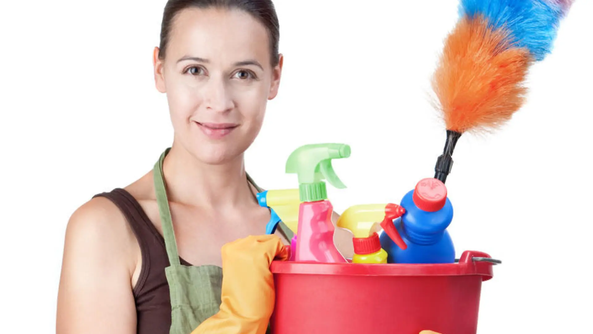 A young woman with cleaning equipment ready to clean - on white.