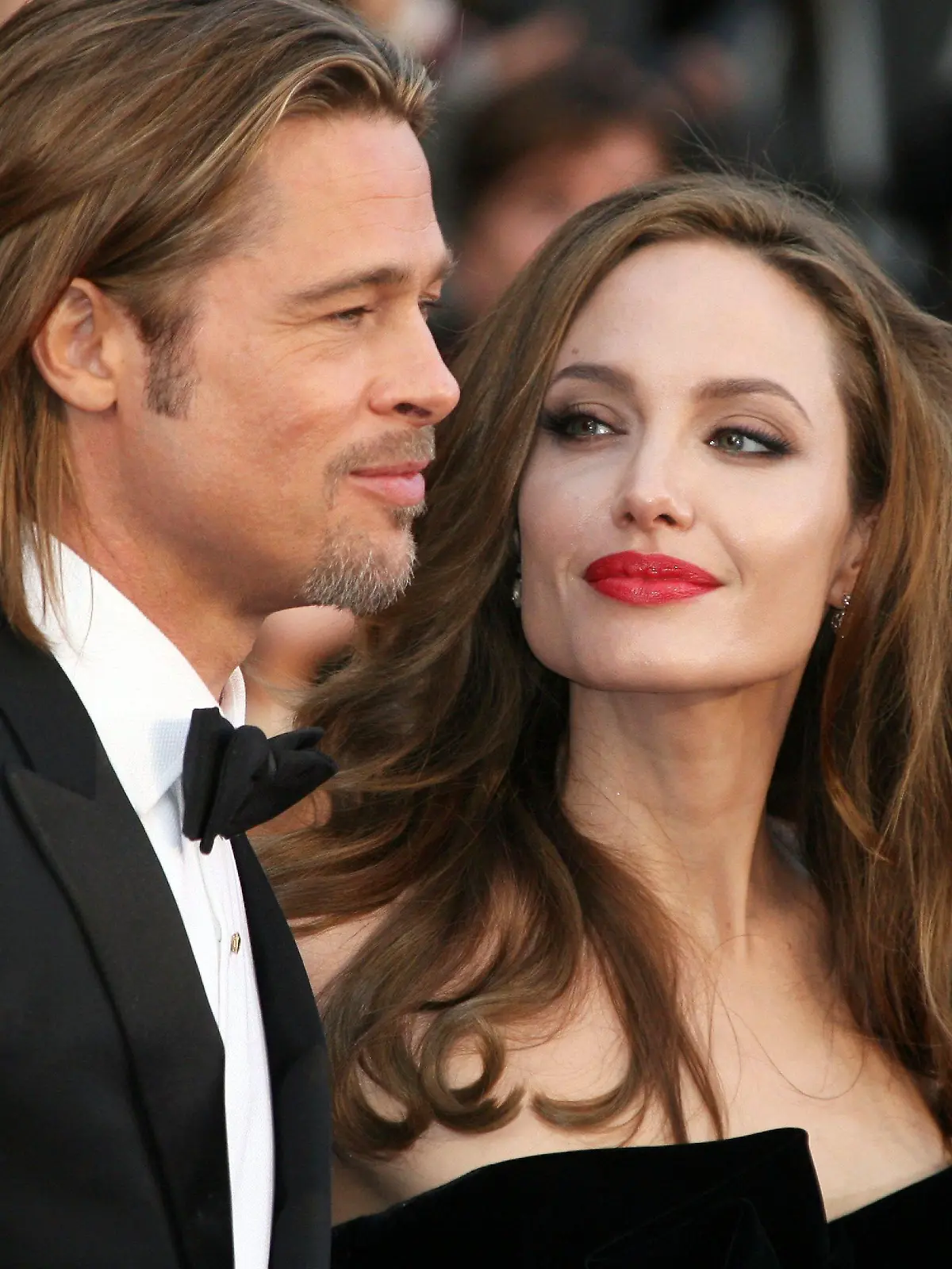 ***File Photos*** MANAGER CONFIRMS PITT & JOLIE ARE ENGAGEDBRAD PITT's manager has confirmed reports suggesting he has asked longtime partner ANGELINA JOLIE to be his wife.  The news comes two days after Jolie debuted a new prize on her ring finger during a trip to the Los Angeles County Museum of Art's Chinese Galleries with Pitt and their adopted son Pax on Wednesday (11Apr12) - and hours after a representative for jewellery designer Robert Procop, who created the Style of Jolie collection with the Oscar winner, confirmed he collaborated with the actor on the engagement ring.  A statement from Procop's rep reads: "Working closely with Brad Pitt to realise the star's vision for the ring, Robert Procop was able to source a diamond of the finest quality which was then transformed using Pitt's unique designs, cut with distinctive faceting to a shape and size that perfectly suits Angelina's long, slender fingers.  "Throughout, Brad Pitt remained heavily involved, overseeing every aspect of the creative design process from the perfect cut of the diamond centerpiece - an elongated tablet shape - to the finishing touches such as the mounting of a galaxy of smaller stones which are graduated in size and faceted to match, adding a crowning lustre to the ring.  "The full creative journey - from conception to completion - took a year, with Brad Pitt waiting until the perfect moment to unveil this special jewel to Angelina Jolie."  And now Pitt's manager Cynthia Pett-Dante has confirmed the news, stating, "It is a promise for the future and their kids are very happy."  She adds, "There's no date set at this time."  Pett-Dante also confirmed Pitt designed the ring. (KL/WNWC/MC)Brad Pitt and Angelina Jolie84th Annual Academy Awards (Oscars) held at the Kodak Theatre - ArrivalsLos Angeles, California - 26.02.12Mandatory Credit: Adriana M. Barraza/ WENN.com