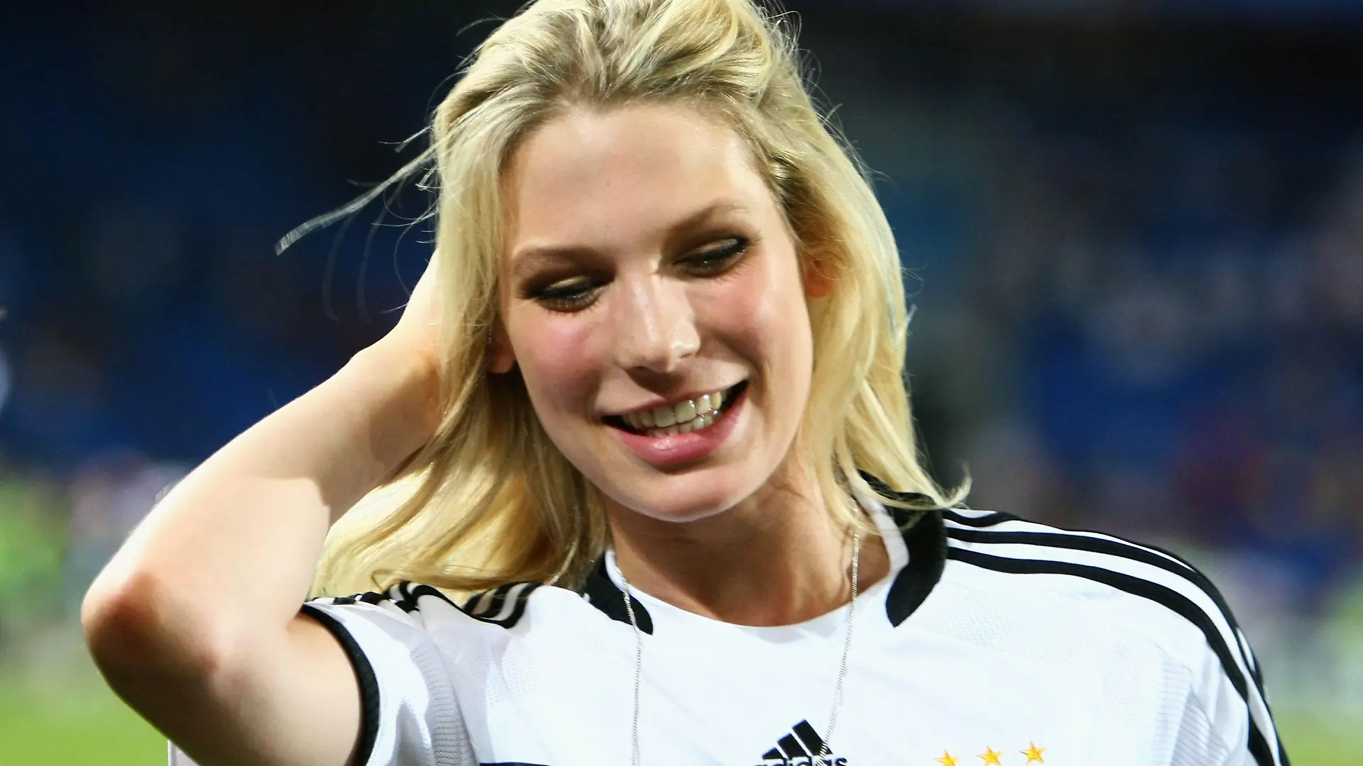 BASEL, SWITZERLAND - JUNE 19:  Sarah Brandner, girlfriend of Bastian Schweinsteiger smiles after Germany defeated Portugal during the UEFA EURO 2008 Quarter Final match between Portugal and Germany at St. Jakob-Park on June 19, 2008 in Basel, Switzerland.  (Photo by Lars Baron/Bongarts/Getty Images)
