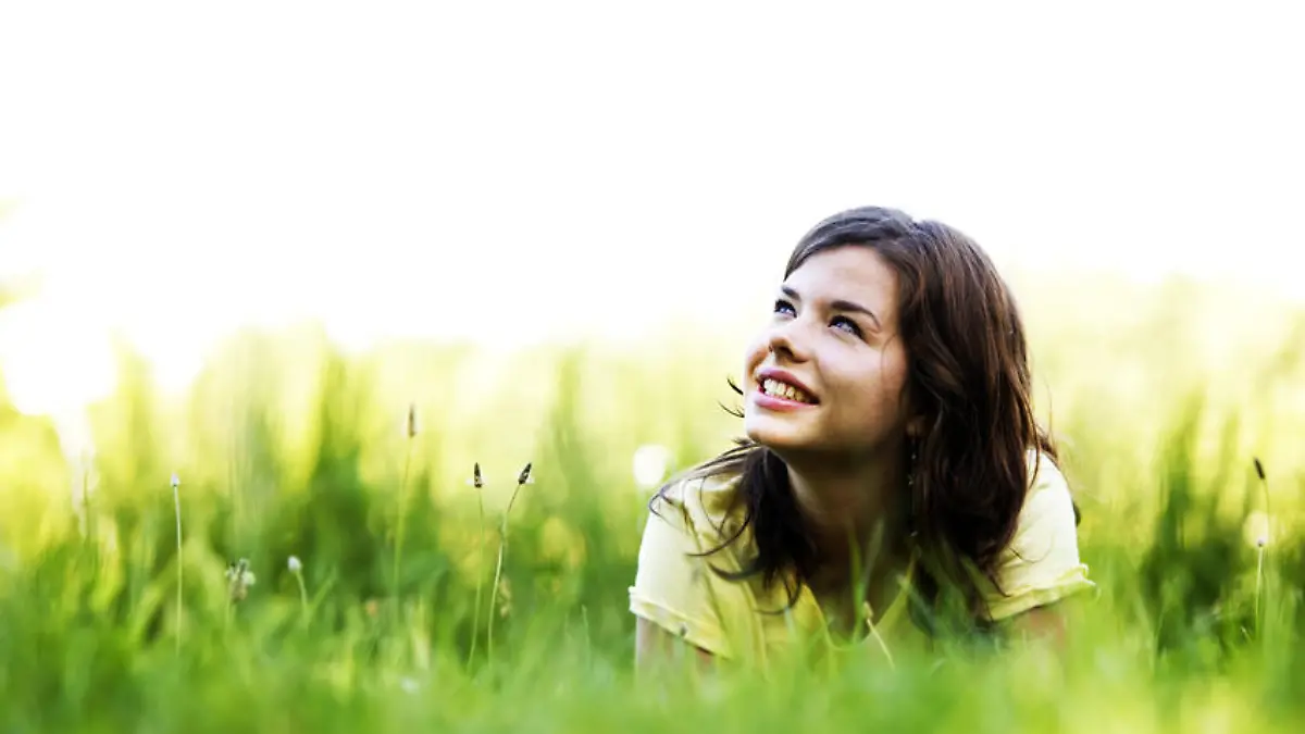 Pretty smiling girl relaxing outdoor