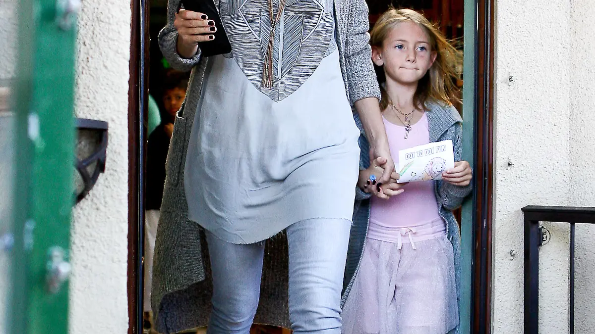Heidi Klum still wearing her wedding band while out in Brentwood with the kids.