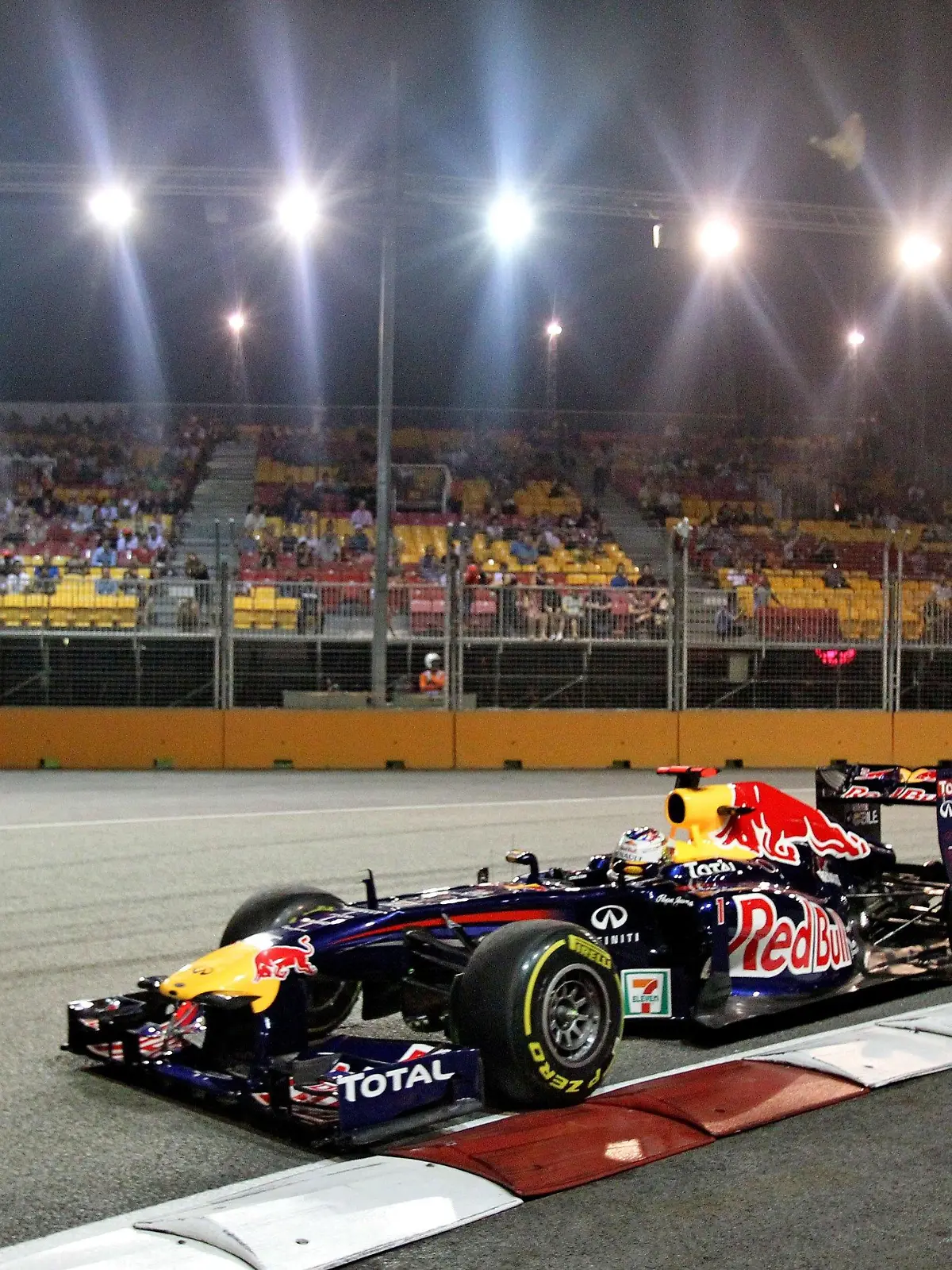 German Formula One driver Sebastian Vettel of Red Bull steers his car during the first practice session at the race track Marina-Bay-Street-Circuit, Singapore, 23 September 2011. The Formula One Grand Prix of Singapore will take place on 25 September 2011. Photo: Jan Woitas dpa  +++(c) dpa - Bildfunk+++