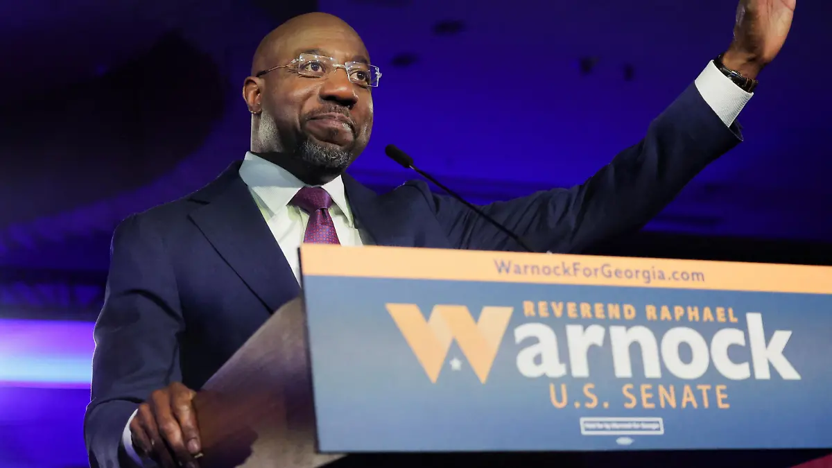 U.S. Senator Raphael Warnock (D-GA) speaks during an election night party after a projected win in the U.S. midterm runoff election between Warnock and his Republican challenger Herschel Walker in Atlanta, Georgia, U.S., December 6, 2022. REUTERS/Carlos Barria