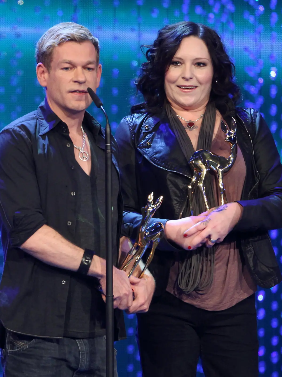 AnNa R. and Peter Plate of German band Rosenstolz receive the 'Comeback' Bambi trophy during the award ceremony in Wiesbaden, Germany, 10 November 2011. The Bambis are the main German media awards and are presented for the 63rd time. Photo: Michael Kappeler dpa/lhe  +++(c) dpa - Bildfunk+++