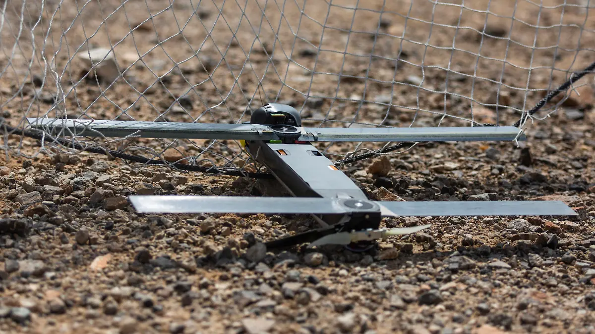 This image provided by the U.S. Marine Corps, shows a Switchblade 300 10C drone system being used as part of a training exercise at Marine Corps Air Ground Combat Center Twentynine Palms, Calif., on Sept. 24, 2021. (Cpl. Alexis Moradian/U.S. Marine Corps via AP)